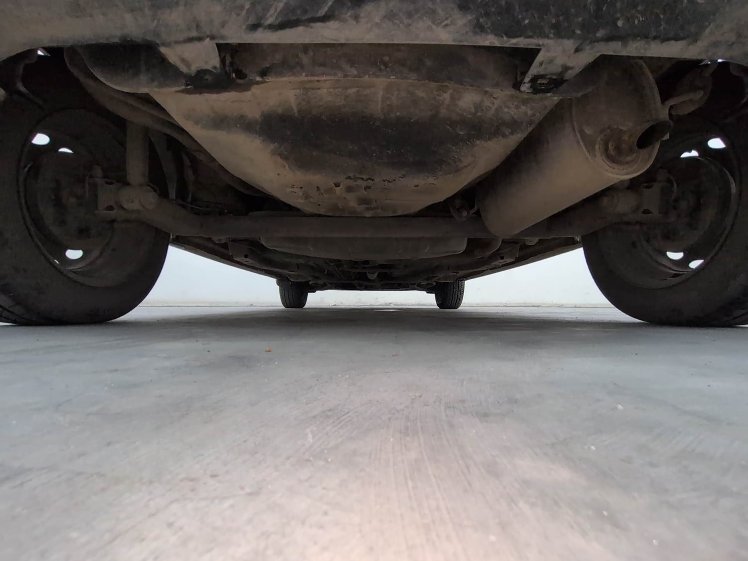 Used 2021 Tata Tiago XE Petrol Manual extra REAR UNDERBODY VIEW (TAKEN FROM REAR)