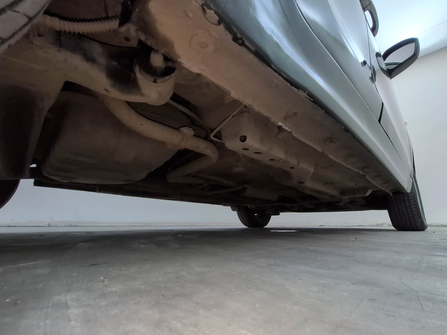 Used 2021 Tata Tiago XE Petrol Manual extra REAR RIGHT UNDERBODY VIEW