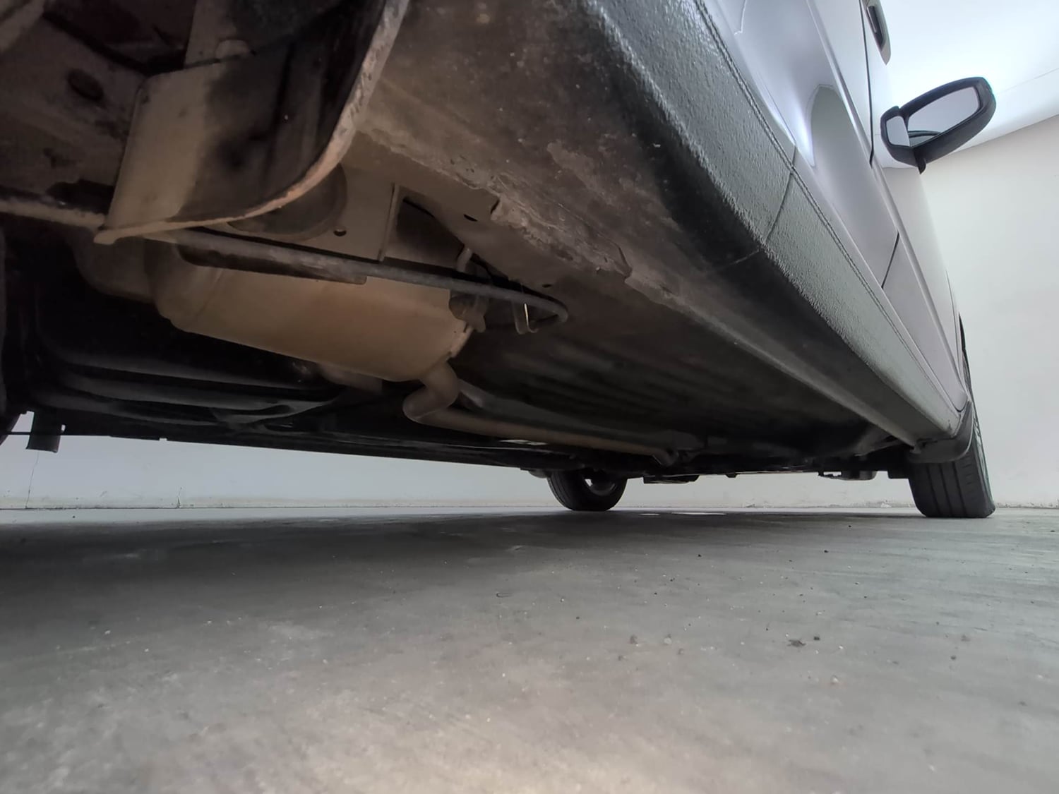 Used 2023 Honda Amaze VX 1.2 Petrol MT Petrol Manual extra REAR RIGHT UNDERBODY VIEW