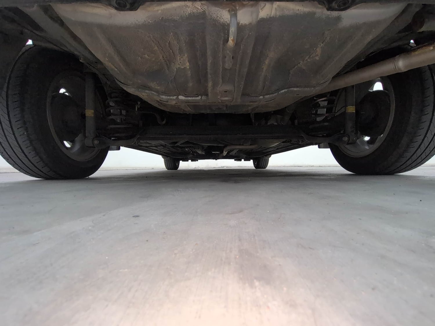 Used 2023 Honda Amaze VX 1.2 Petrol MT Petrol Manual extra REAR UNDERBODY VIEW (TAKEN FROM REAR)
