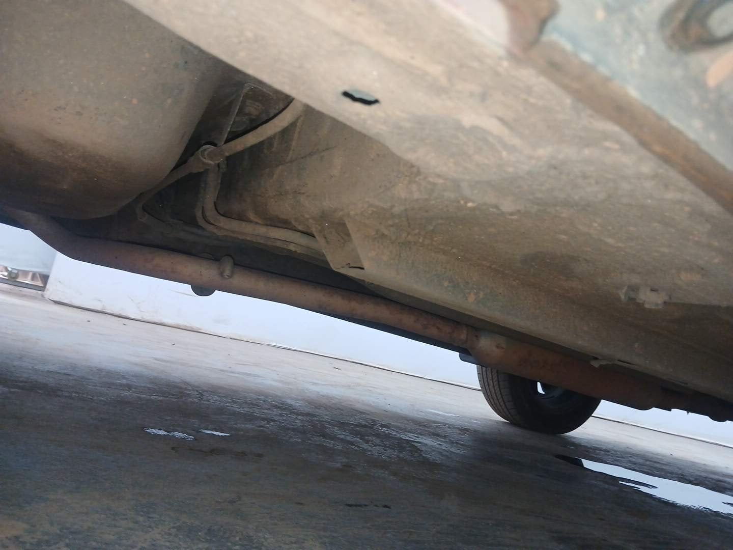 Used 2021 Renault Kiger RXZ Turbo CVT Dual Tone Petrol Automatic extra REAR RIGHT UNDERBODY VIEW