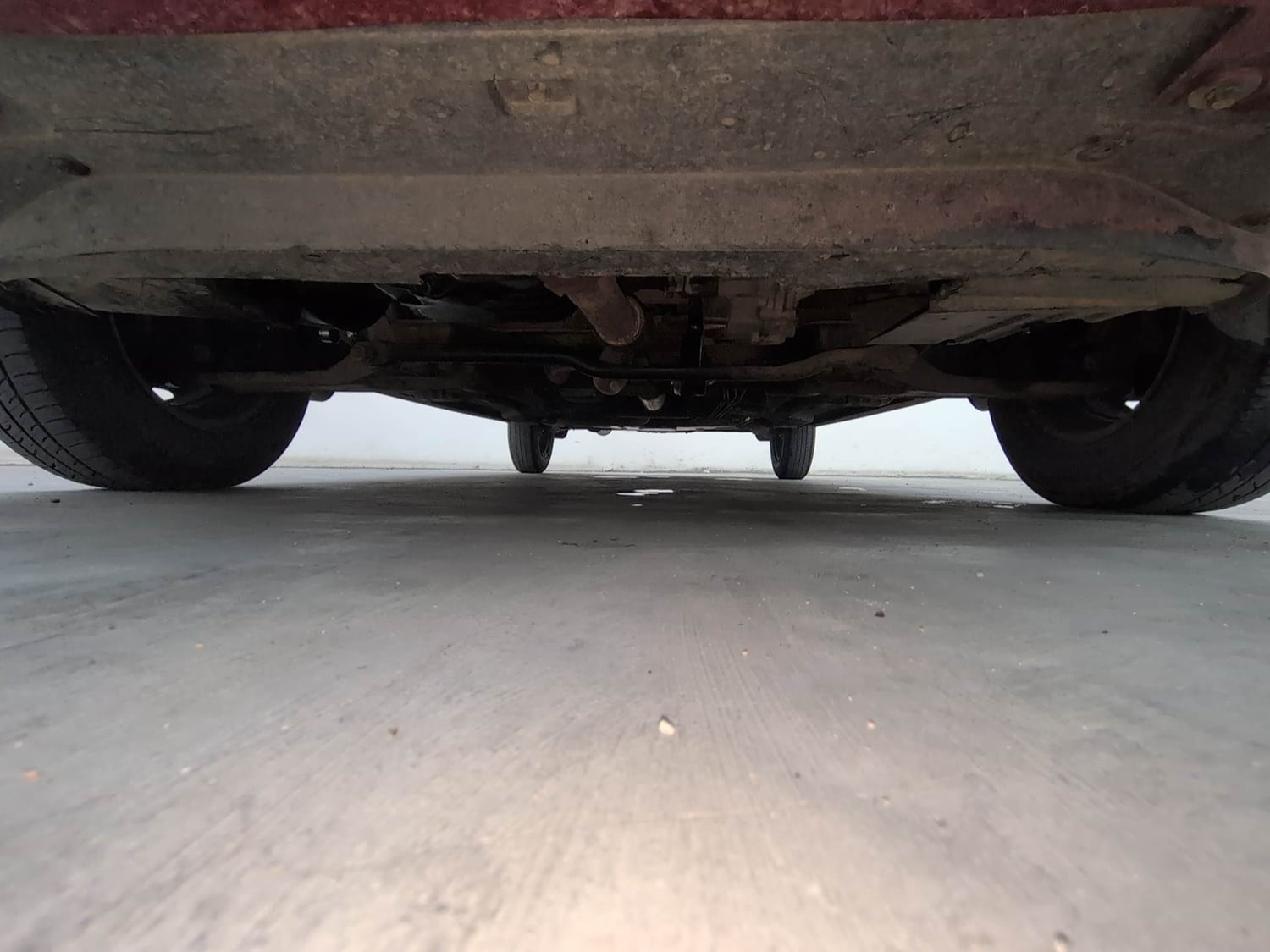 Used 2017 Tata Tiago Revotron XE Petrol Manual extra FRONT LEFT UNDERBODY VIEW