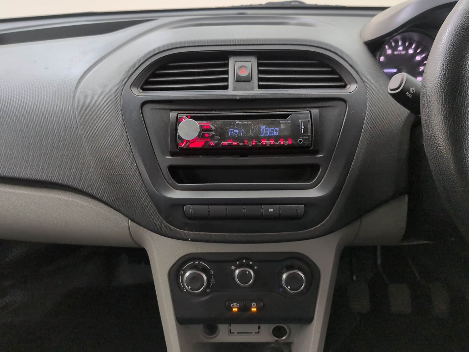 Used 2017 Tata Tiago Revotron XE Petrol Manual interior MUSIC SYSTEM & AC CONTROL VIEW