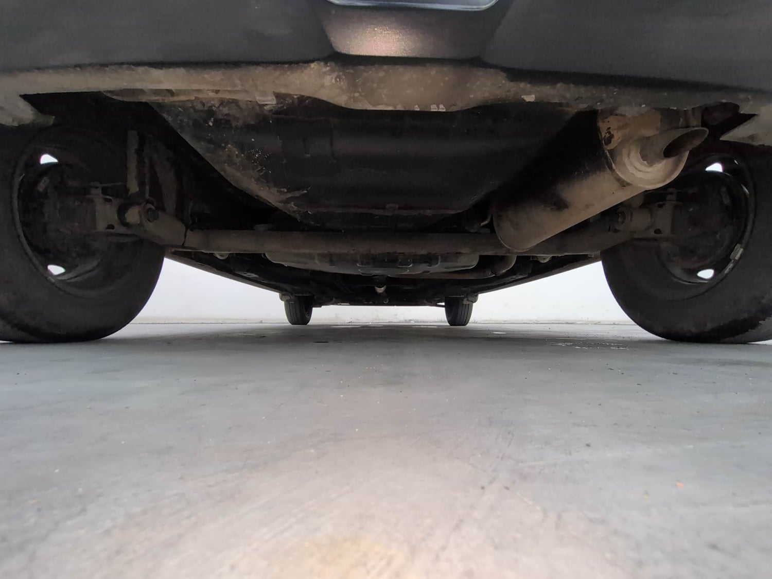 Used 2017 Tata Tiago Revotron XE Petrol Manual extra REAR UNDERBODY VIEW (TAKEN FROM REAR)