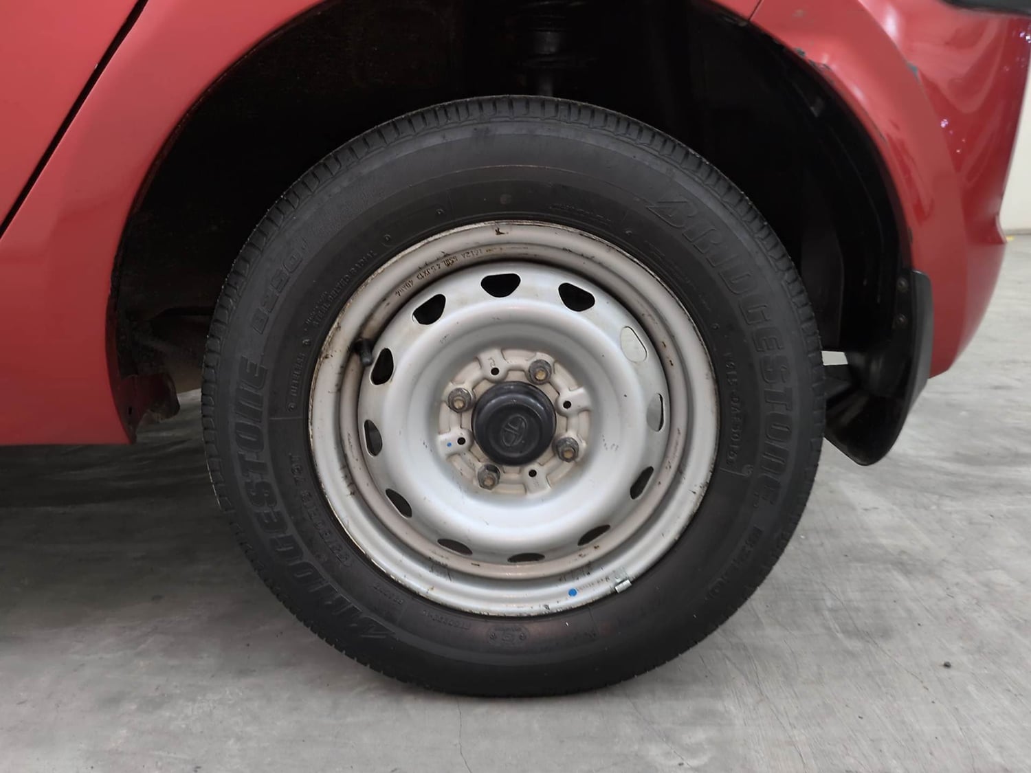 Used 2017 Tata Tiago Revotron XE Petrol Manual tyres LEFT REAR TYRE RIM VIEW