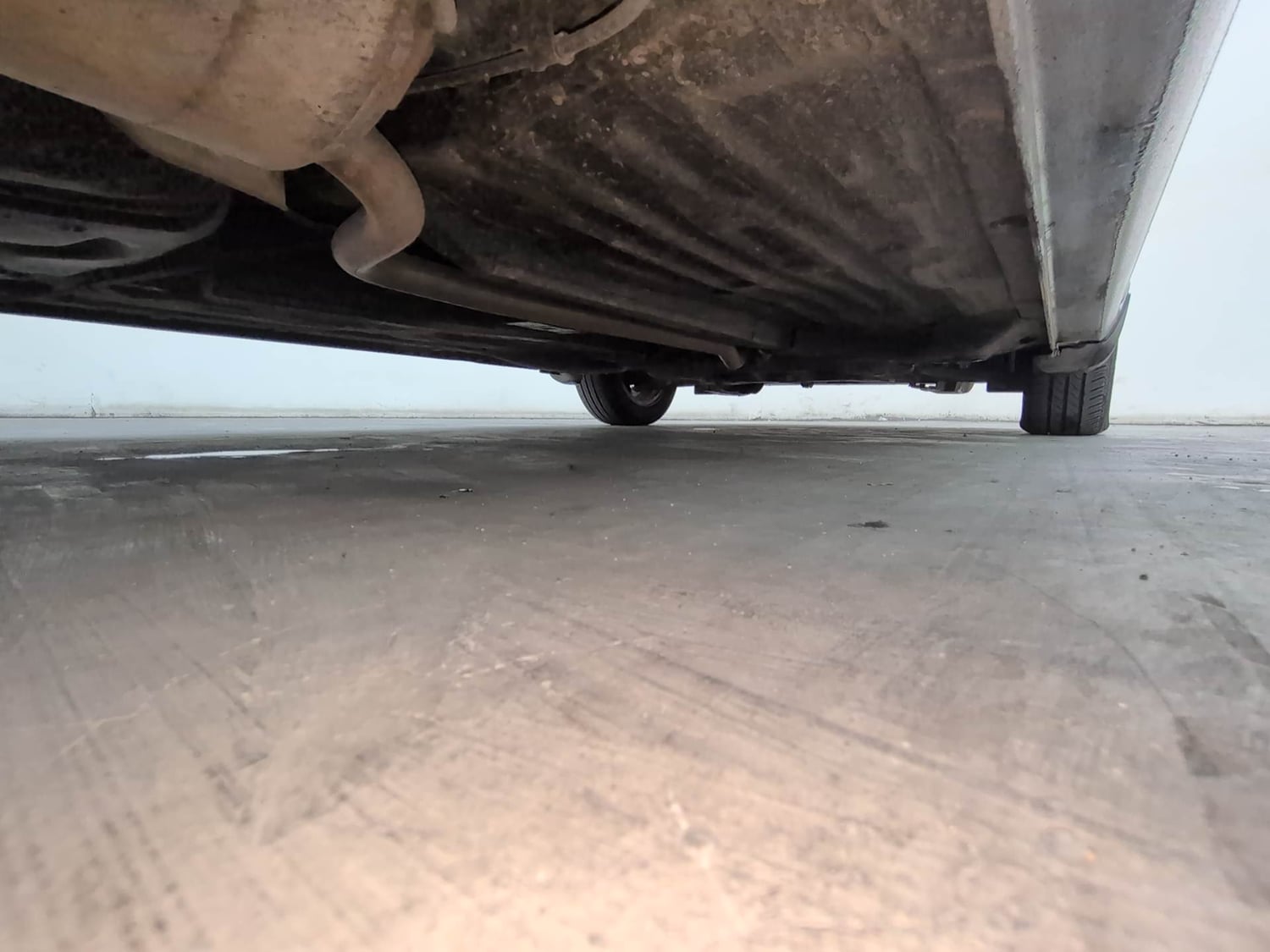 Used 2022 Honda Amaze VX MT 1.2 Petrol Petrol Manual extra REAR RIGHT UNDERBODY VIEW