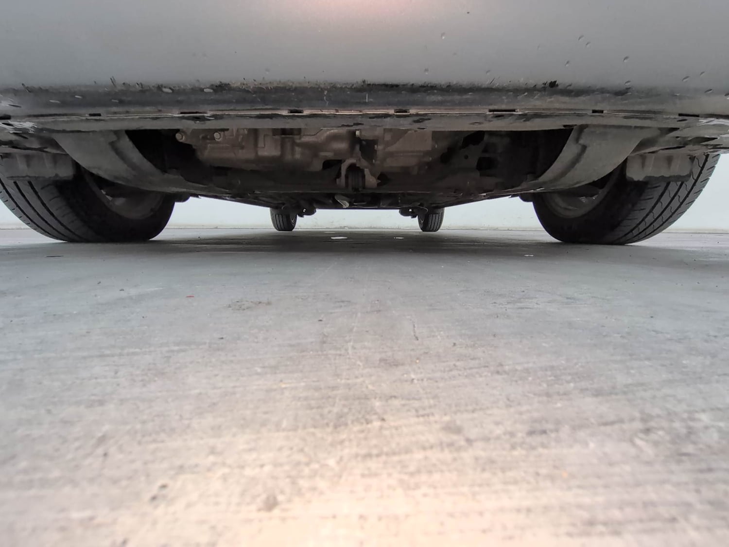 Used 2022 Honda Amaze VX MT 1.2 Petrol Petrol Manual extra FRONT LEFT UNDERBODY VIEW