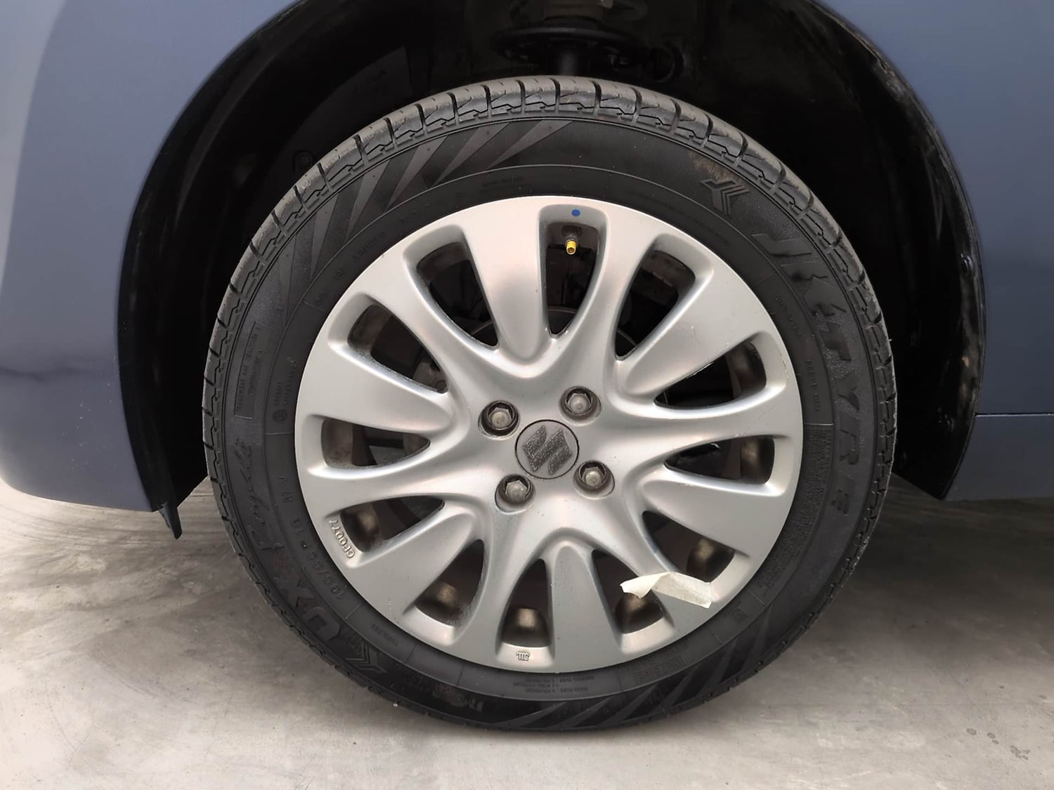 Used 2016 Maruti Suzuki Baleno Zeta 1.2 Petrol Manual tyres LEFT FRONT TYRE RIM VIEW