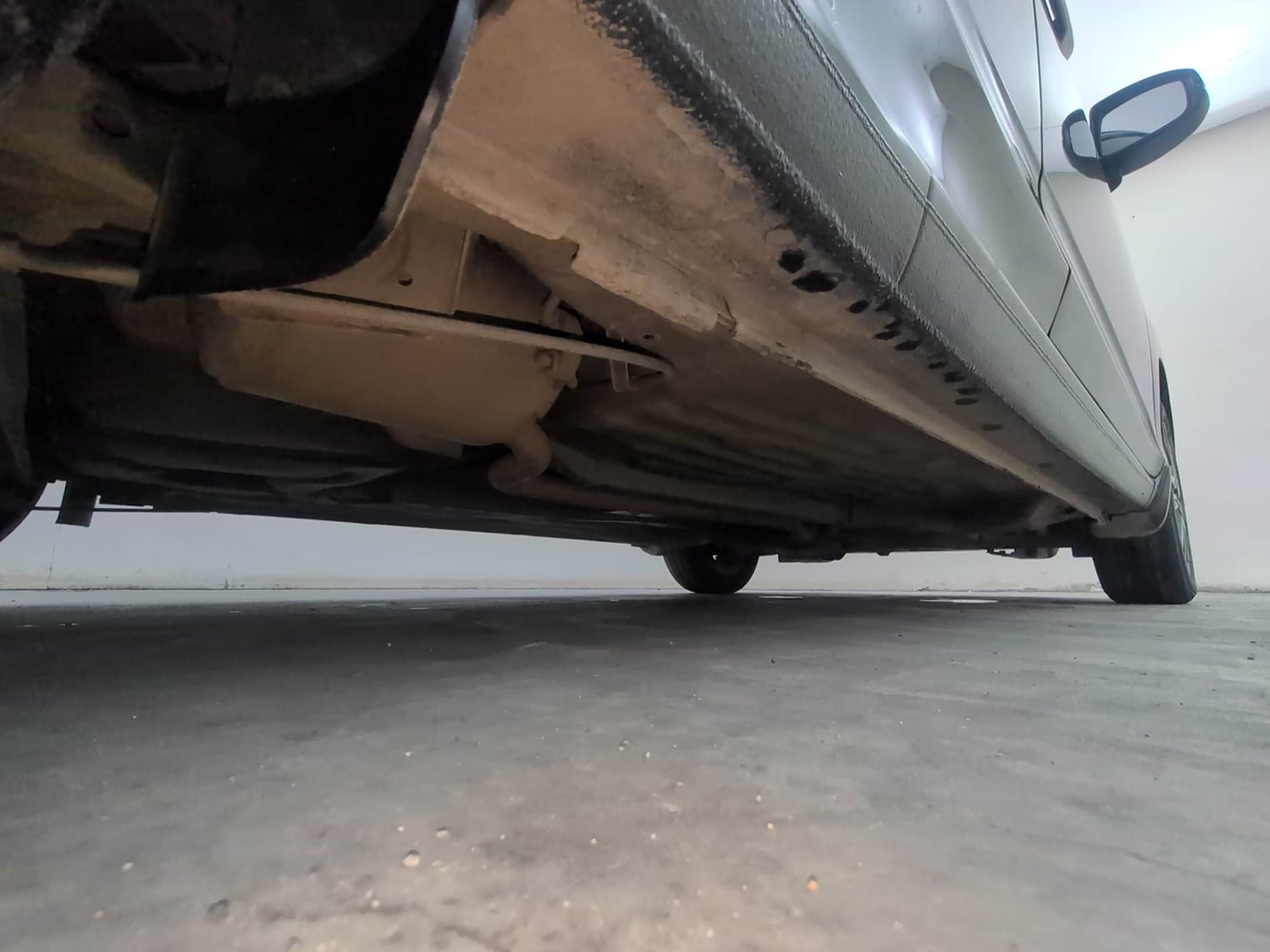 Used 2023 Honda Amaze VX MT 1.2 Petrol Petrol Manual extra REAR RIGHT UNDERBODY VIEW