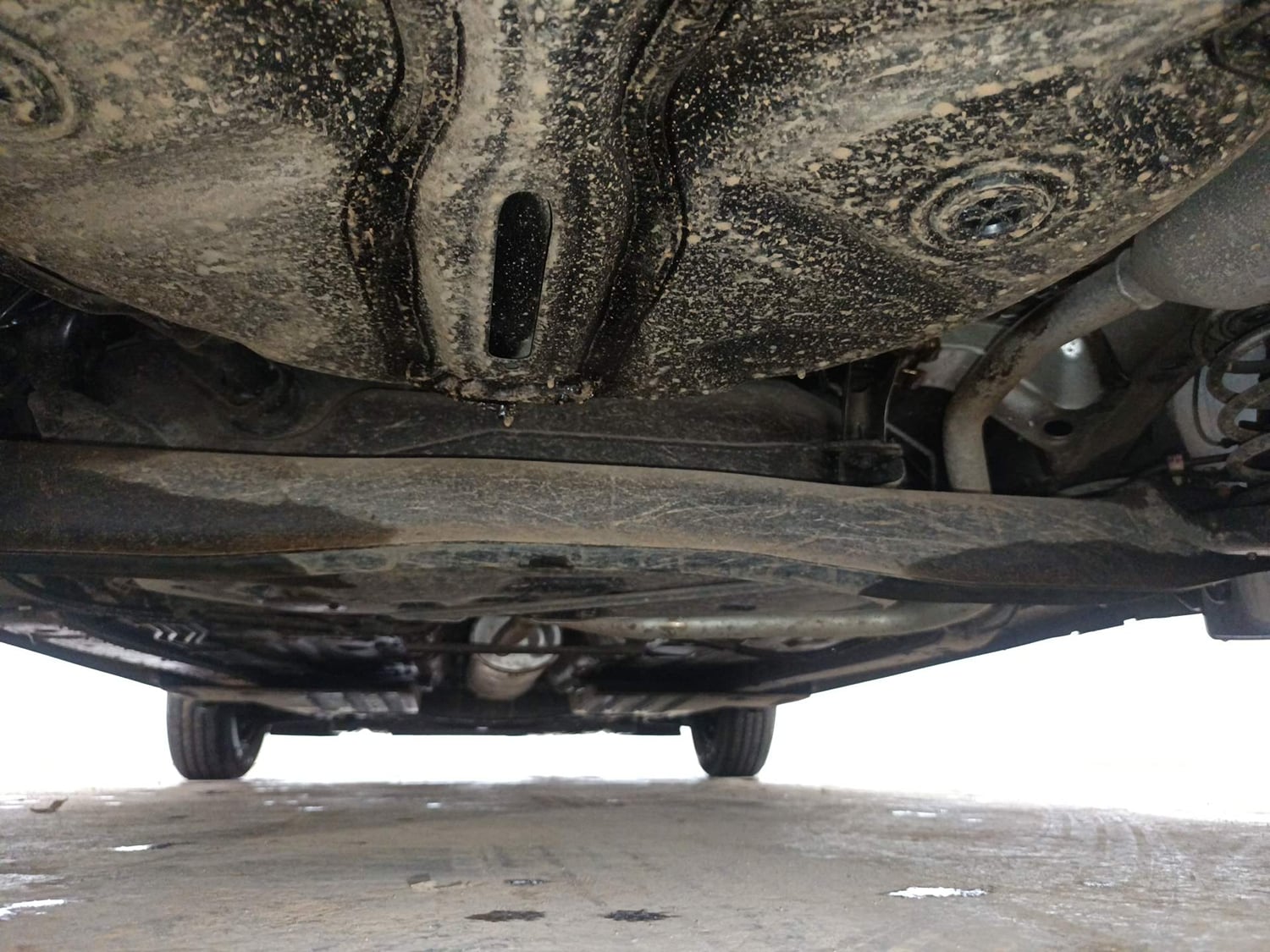 Used 2025 Maruti Suzuki Swift VXi (O) AMT Petrol Automatic extra REAR UNDERBODY VIEW (TAKEN FROM REAR)