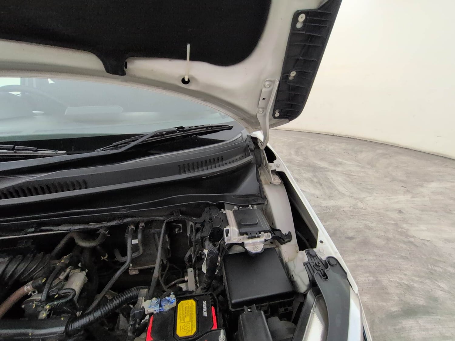 Used 2024 Maruti Suzuki Ignis Zeta 1.2 MT Petrol Manual engine ENGINE LEFT SIDE HINGE & APRON VIEW