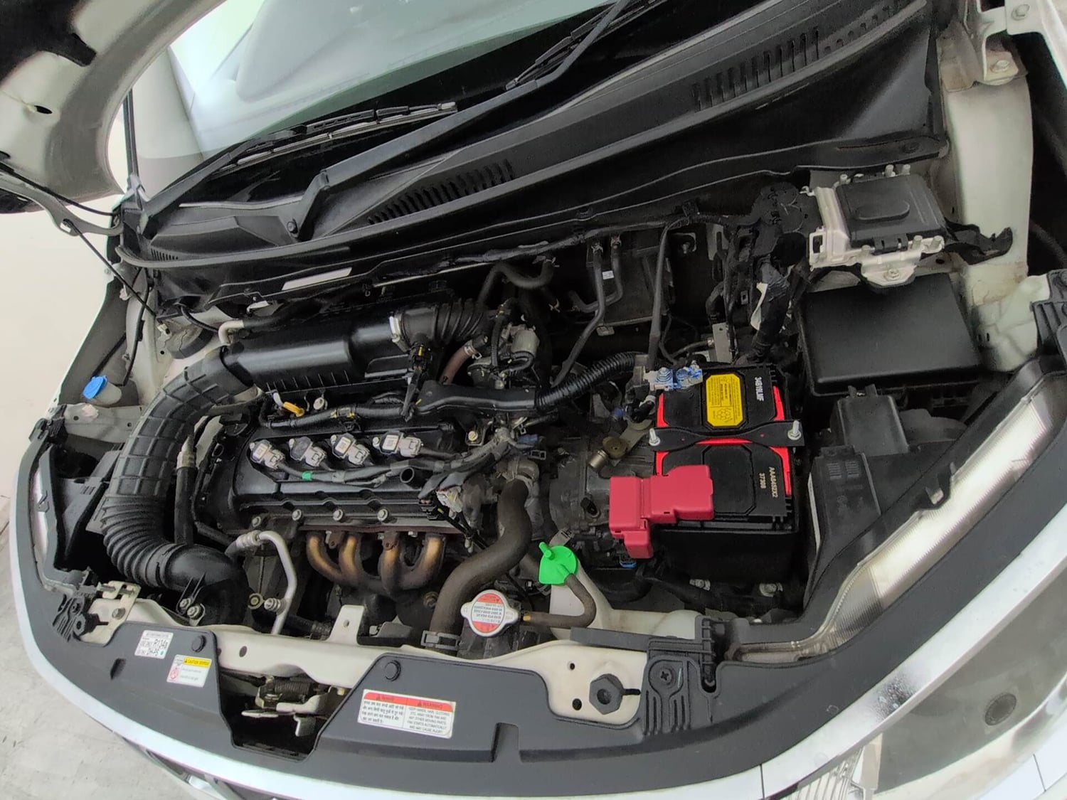Used 2024 Maruti Suzuki Ignis Zeta 1.2 MT Petrol Manual engine ENGINE LEFT SIDE VIEW