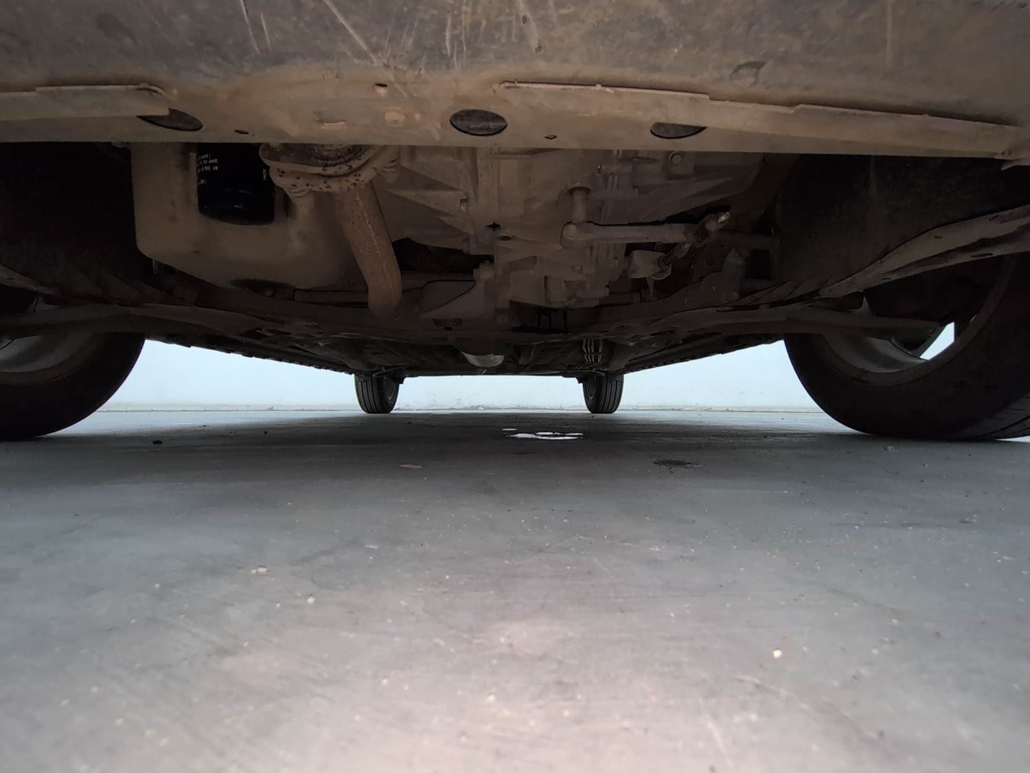 Used 2024 Maruti Suzuki Ignis Zeta 1.2 MT Petrol Manual extra FRONT LEFT UNDERBODY VIEW