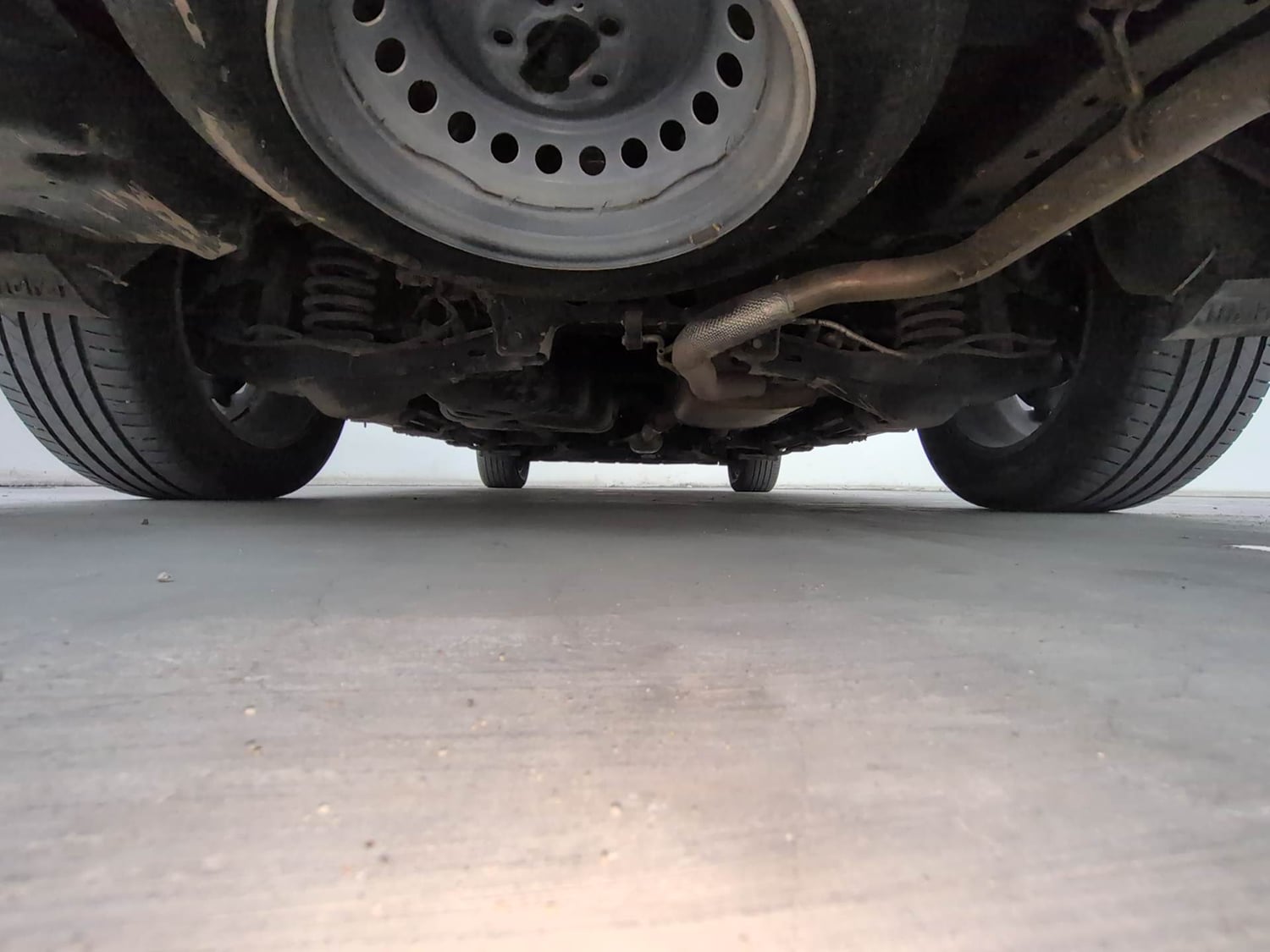 Used 2024 Mahindra XUV700 AX 7 Luxury Pack Diesel AT 7 STR Diesel Automatic extra REAR UNDERBODY VIEW (TAKEN FROM REAR)