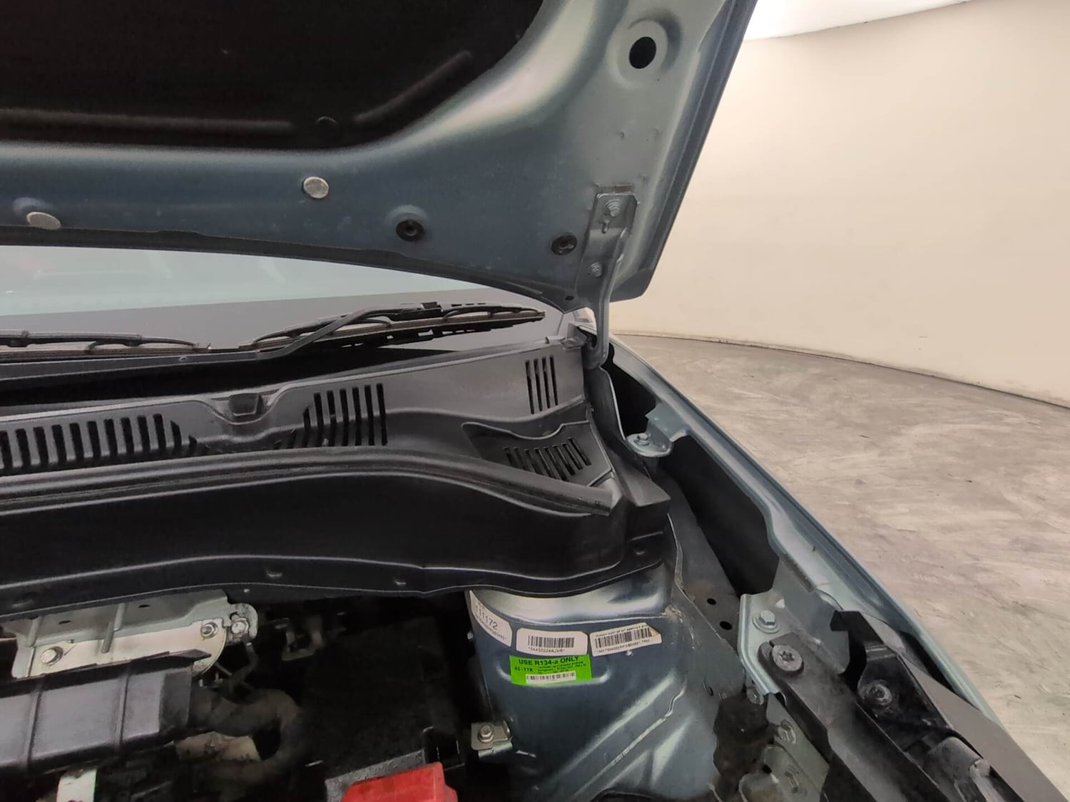 Used 2023 Tata Punch Adventure MT Petrol Manual engine ENGINE LEFT SIDE HINGE & APRON VIEW
