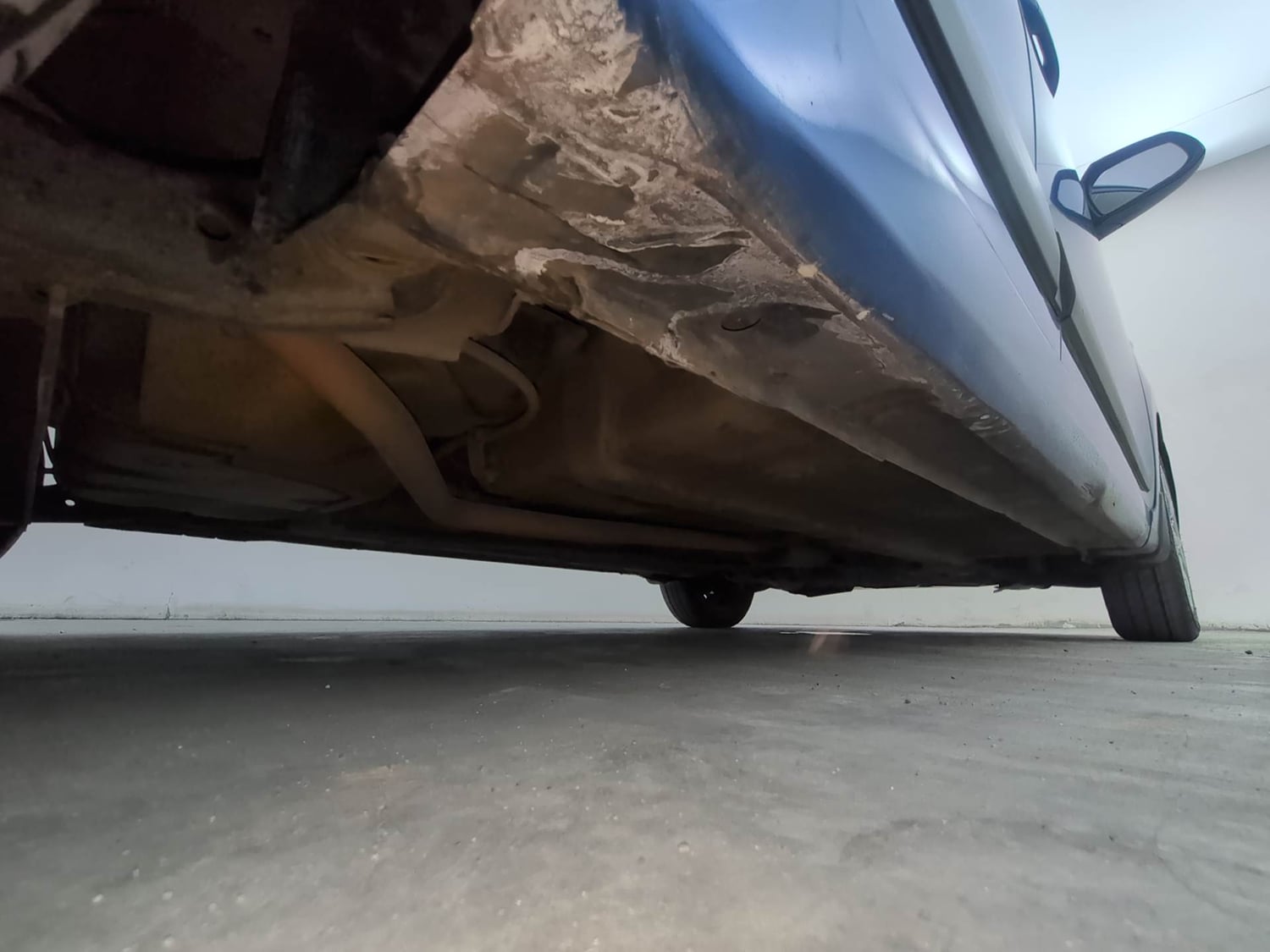 Used 2019 Hyundai Grand i10 Magna 1.2 Kappa VTVT Petrol Manual extra REAR RIGHT UNDERBODY VIEW