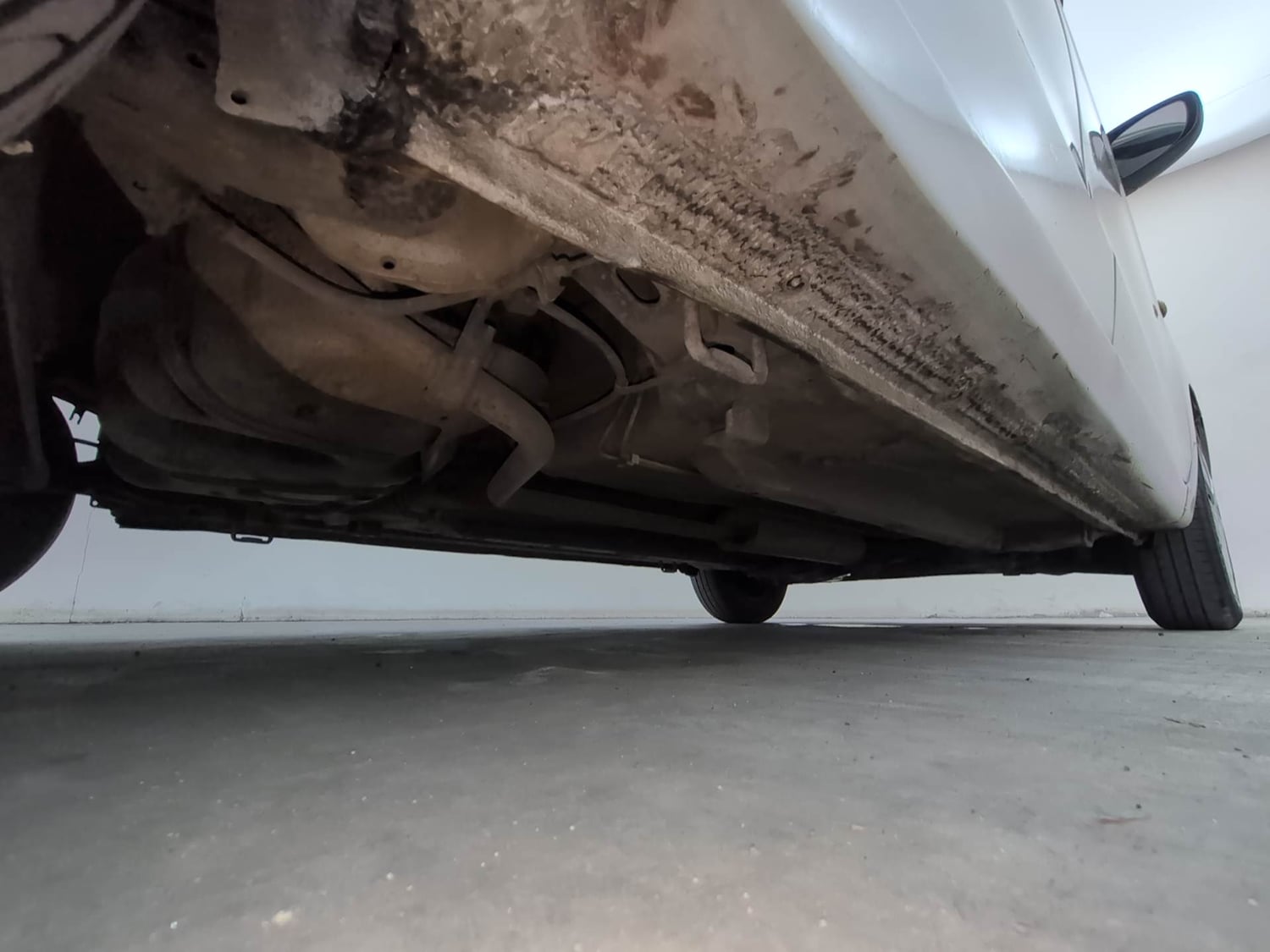 Used 2014 Maruti Suzuki Celerio VXi AMT Petrol Automatic extra REAR RIGHT UNDERBODY VIEW