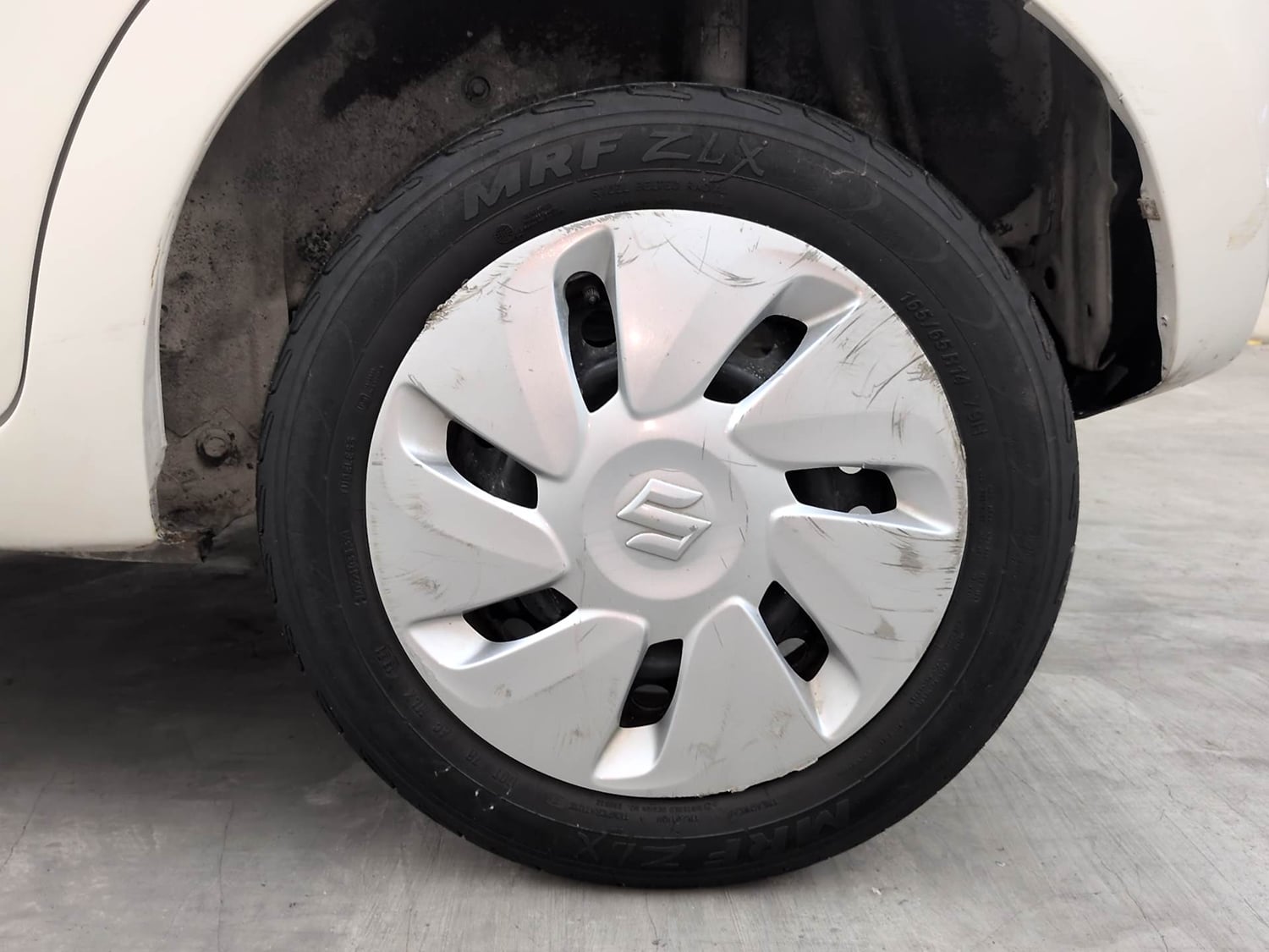 Used 2014 Maruti Suzuki Celerio VXi AMT Petrol Automatic tyres LEFT REAR TYRE RIM VIEW
