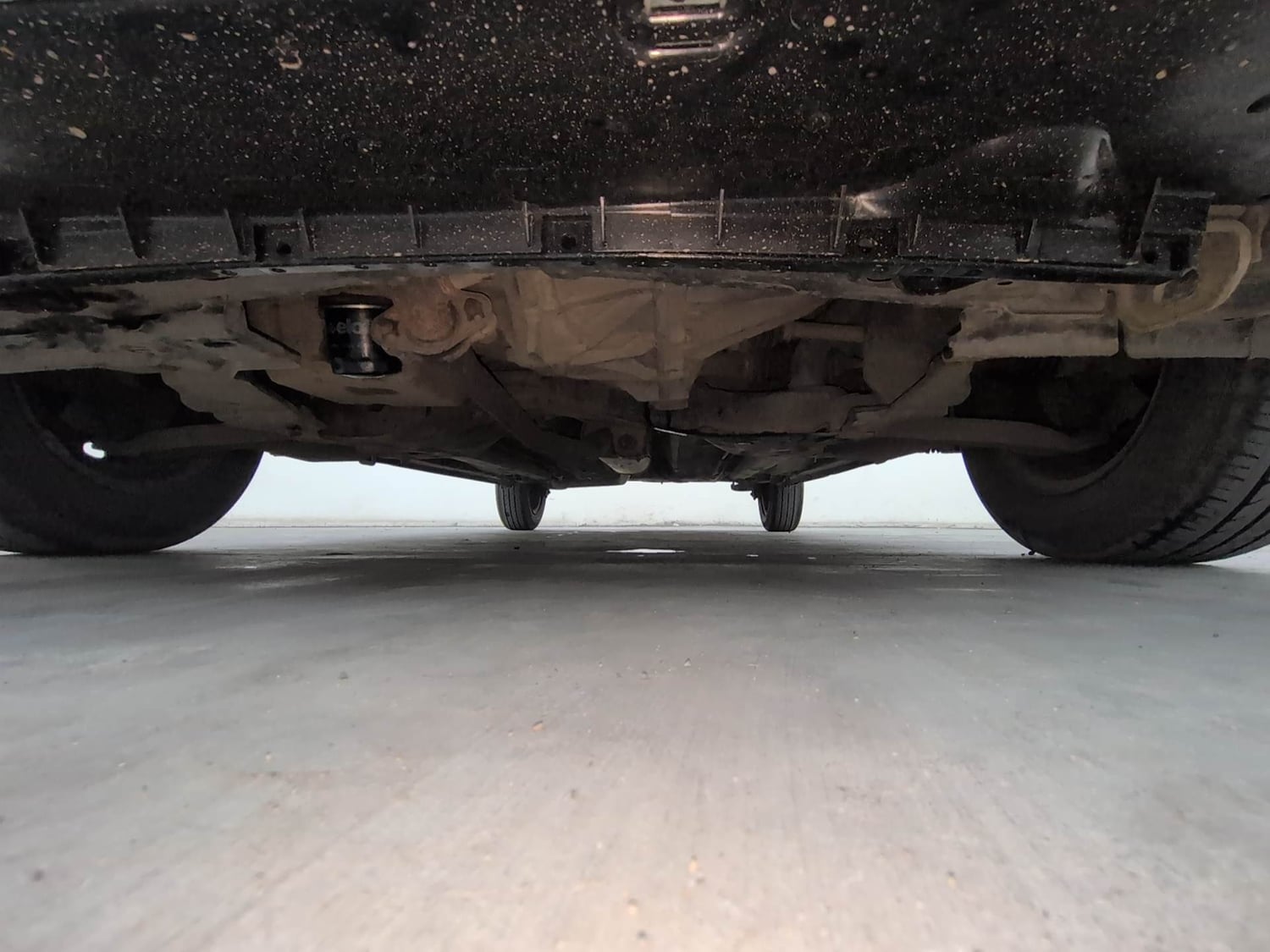 Used 2014 Maruti Suzuki Celerio VXi AMT Petrol Automatic extra FRONT LEFT UNDERBODY VIEW