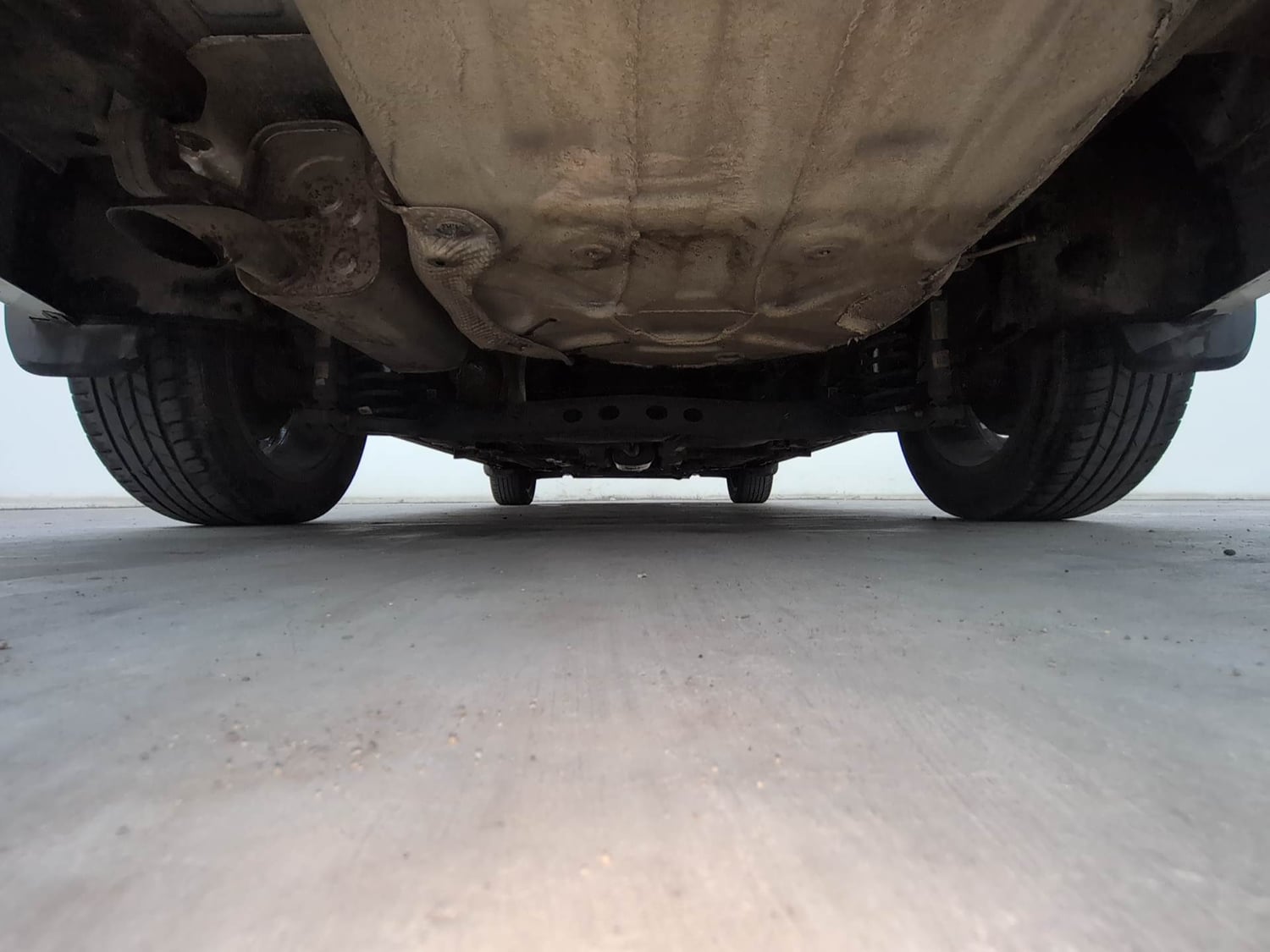 Used 2022 Volkswagen Virtus Topline 1.0 TSI AT Petrol Automatic extra REAR UNDERBODY VIEW (TAKEN FROM REAR)