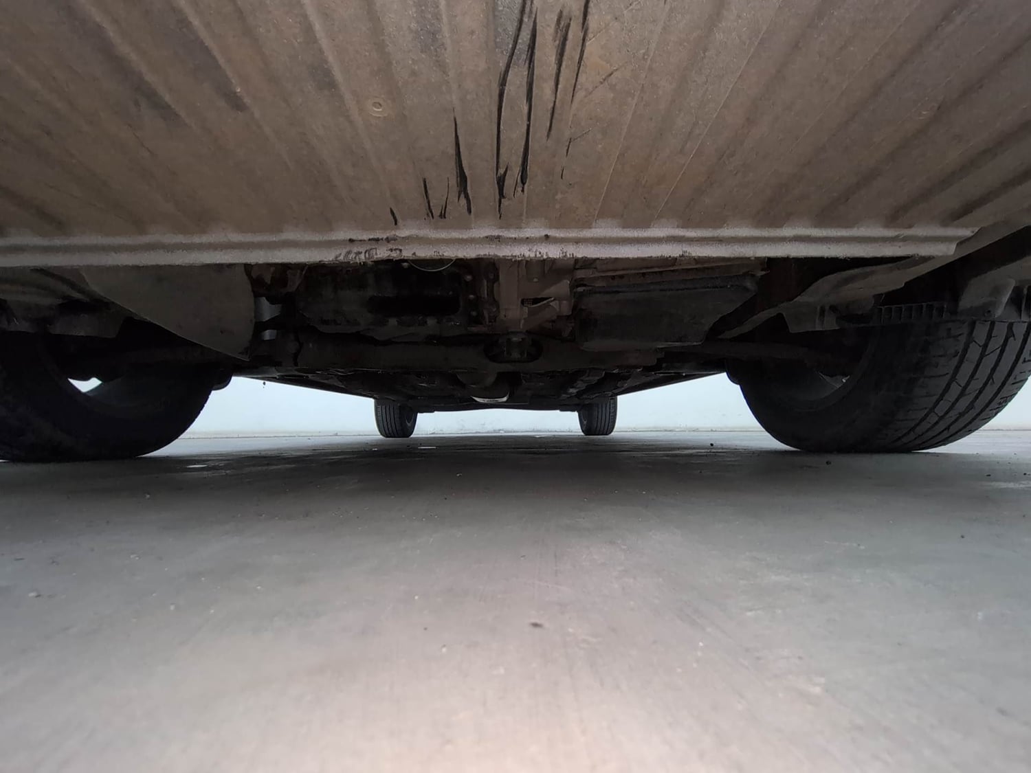 Used 2022 Volkswagen Virtus Topline 1.0 TSI AT Petrol Automatic extra FRONT LEFT UNDERBODY VIEW