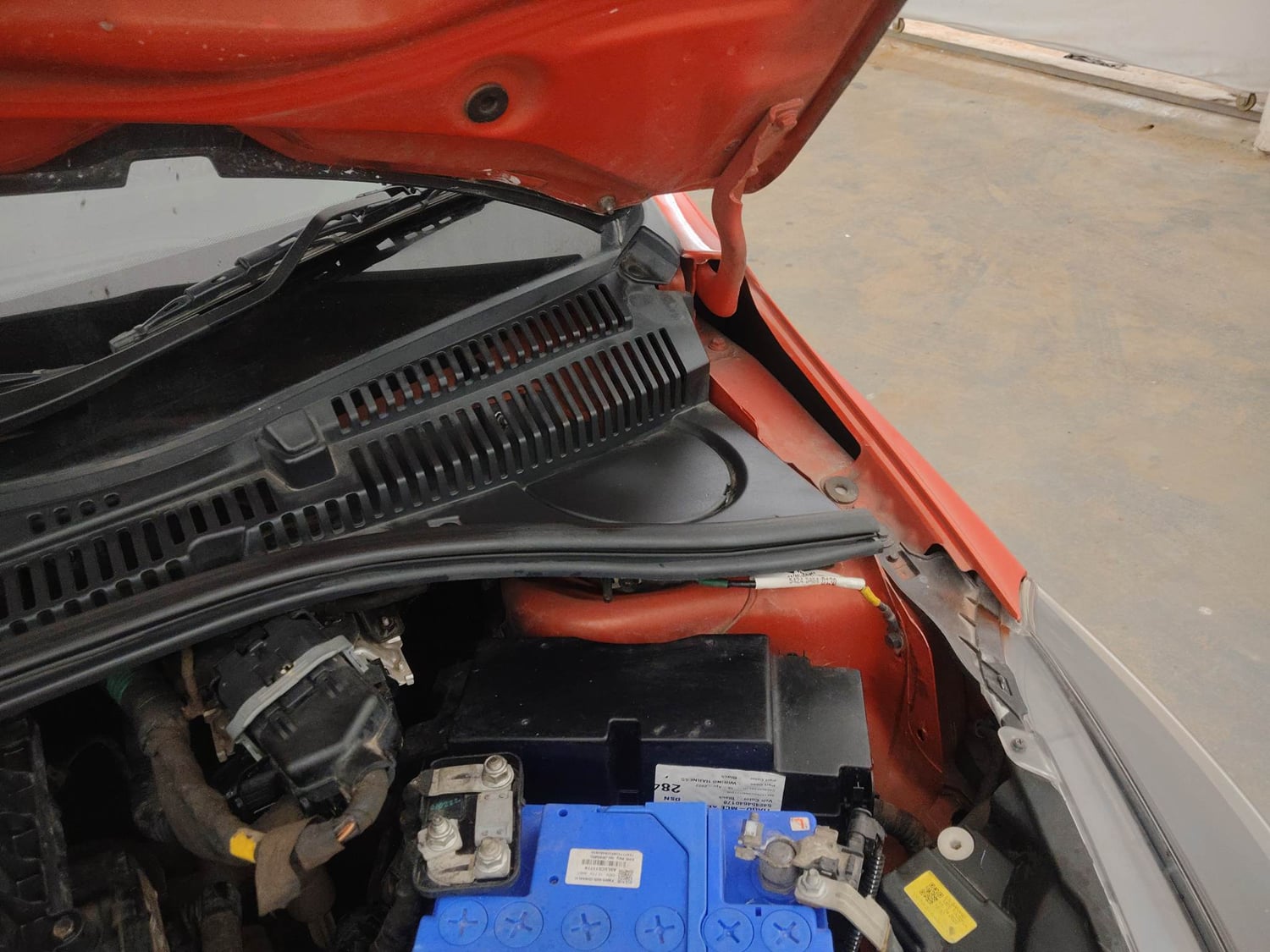 Used 2022 Tata Tiago XE Petrol Manual engine ENGINE LEFT SIDE HINGE & APRON VIEW