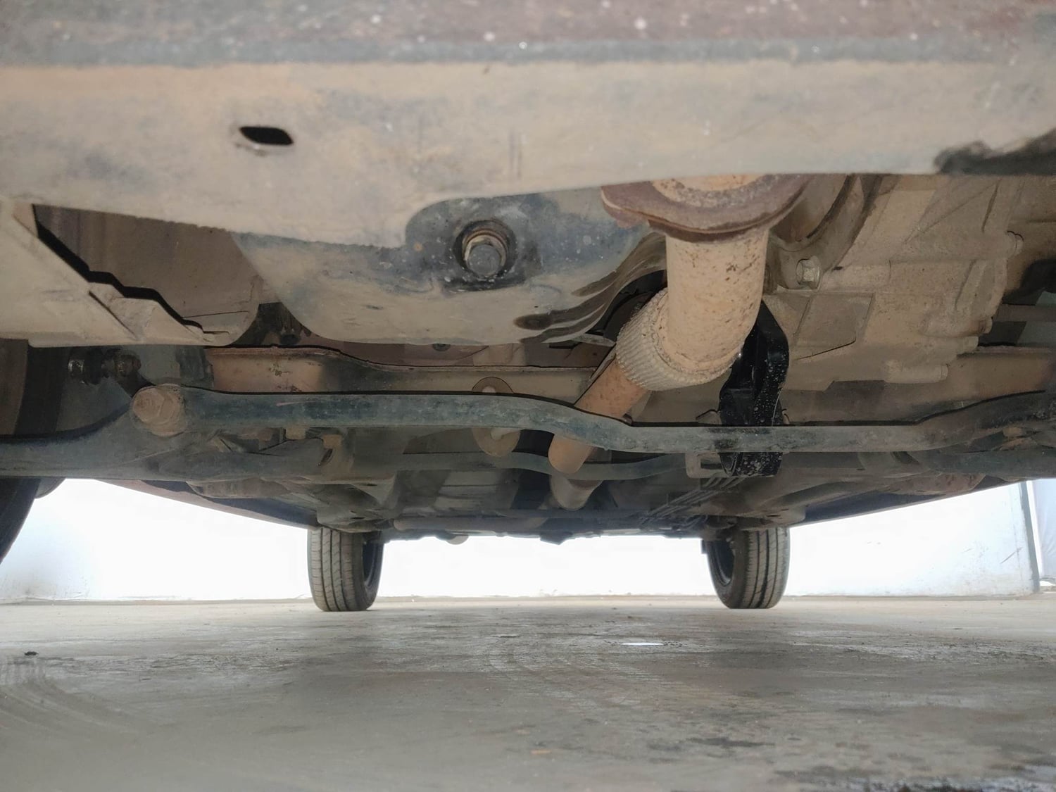 Used 2022 Tata Tiago XE Petrol Manual extra FRONT LEFT UNDERBODY VIEW