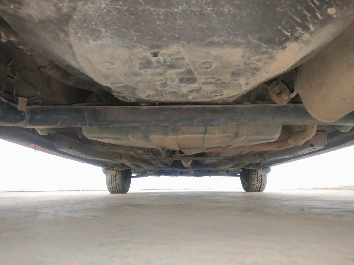 Used 2022 Tata Tiago XE Petrol Manual extra REAR UNDERBODY VIEW (TAKEN FROM REAR)