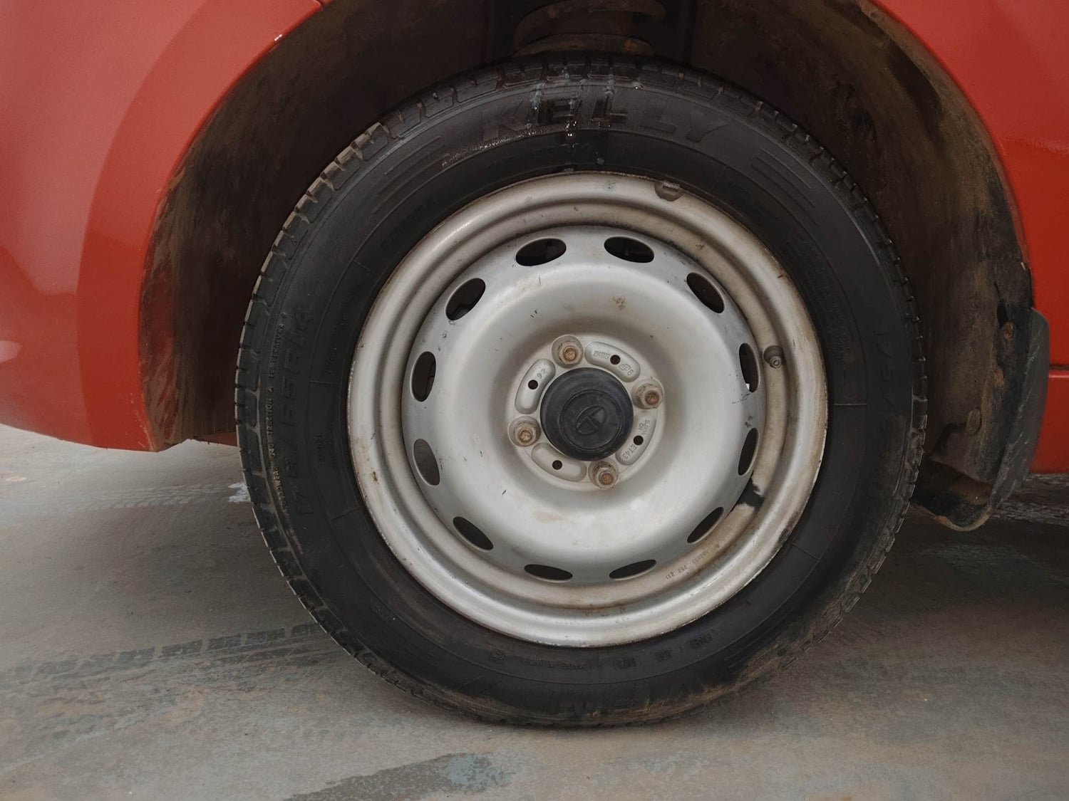Used 2022 Tata Tiago XE Petrol Manual tyres LEFT FRONT TYRE RIM VIEW