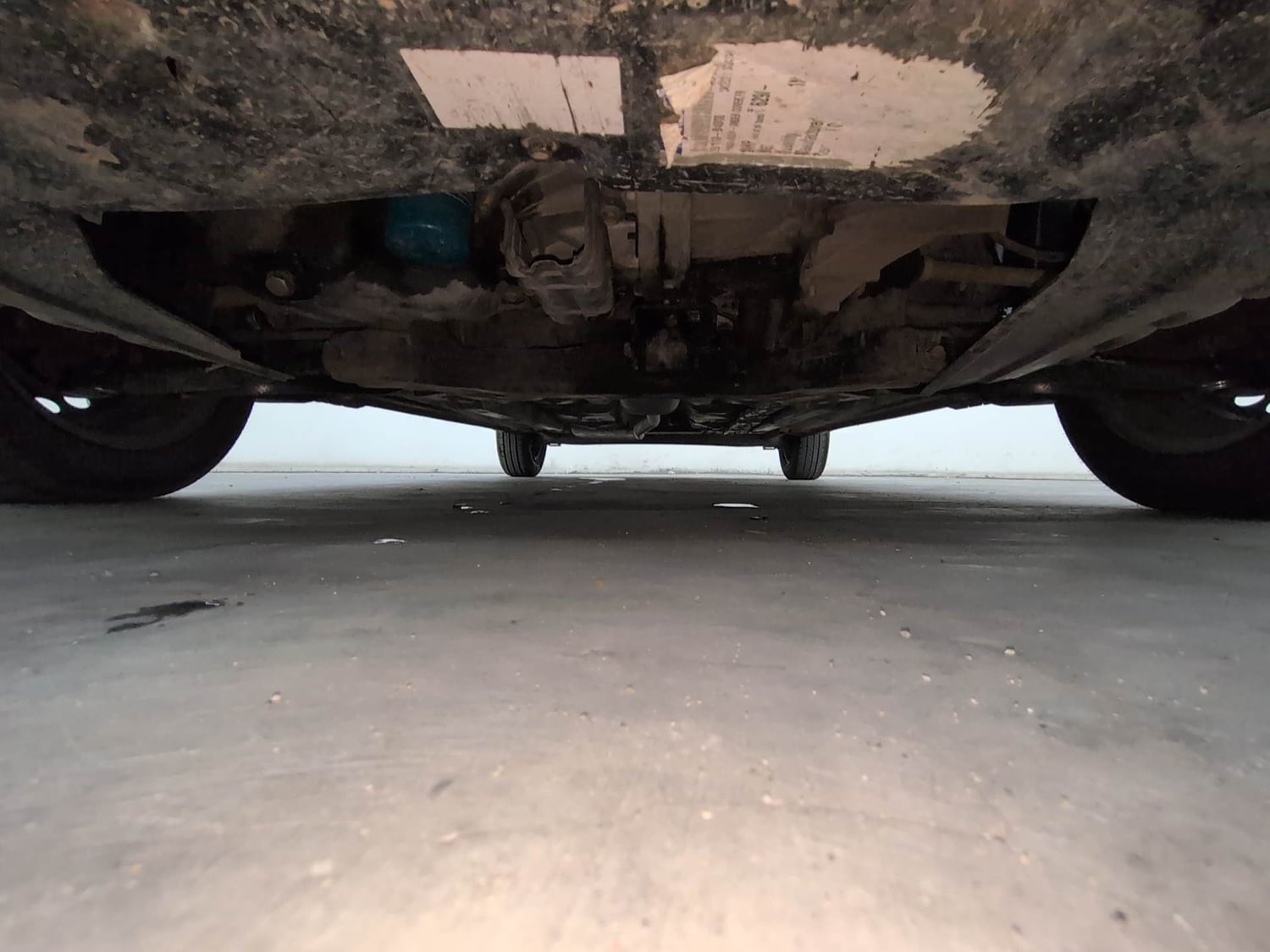 Used 2013 Hyundai Grand i10 Sportz 1.2 Kappa VTVT Petrol Manual extra FRONT LEFT UNDERBODY VIEW