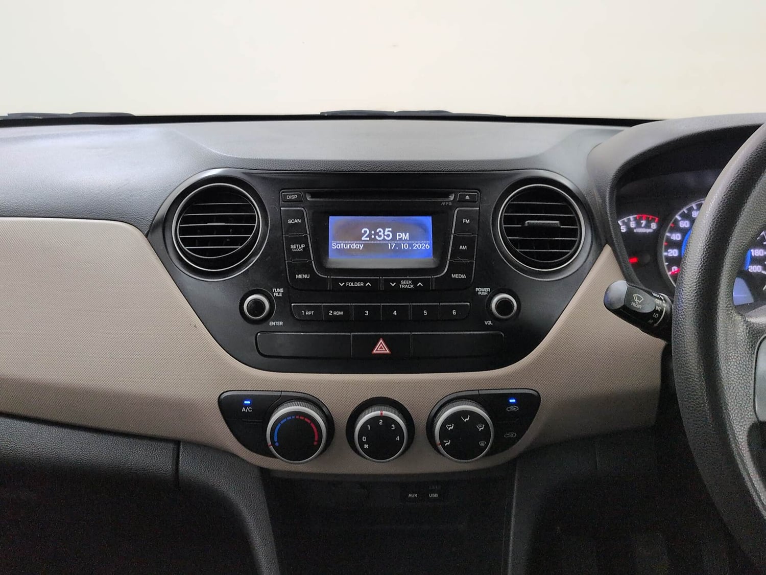 Used 2013 Hyundai Grand i10 Sportz 1.2 Kappa VTVT Petrol Manual interior MUSIC SYSTEM & AC CONTROL VIEW