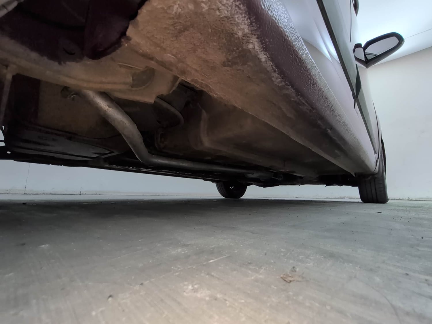 Used 2013 Hyundai Grand i10 Sportz 1.2 Kappa VTVT Petrol Manual extra REAR RIGHT UNDERBODY VIEW