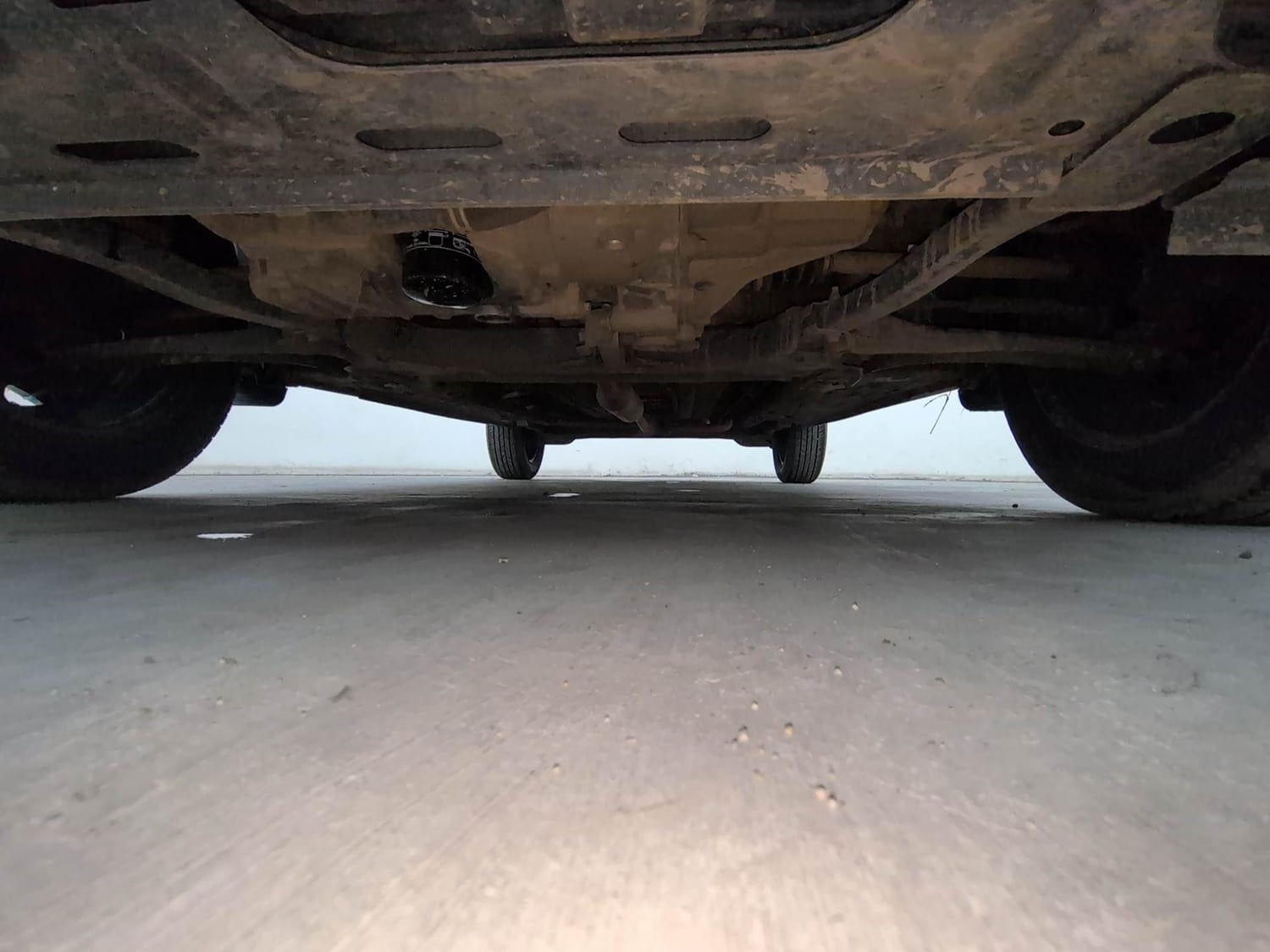 Used 2024 Nissan Magnite XL Petrol Manual extra FRONT LEFT UNDERBODY VIEW
