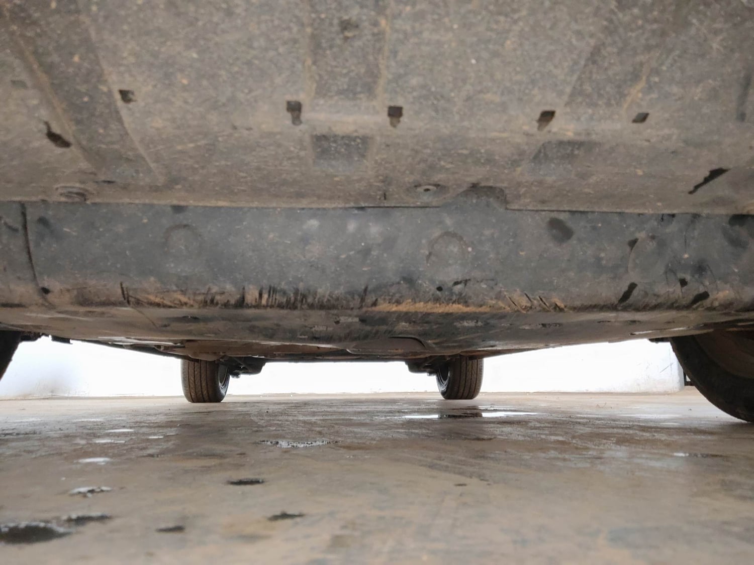 Used 2023 Honda City V Petrol CVT Petrol Automatic extra FRONT LEFT UNDERBODY VIEW