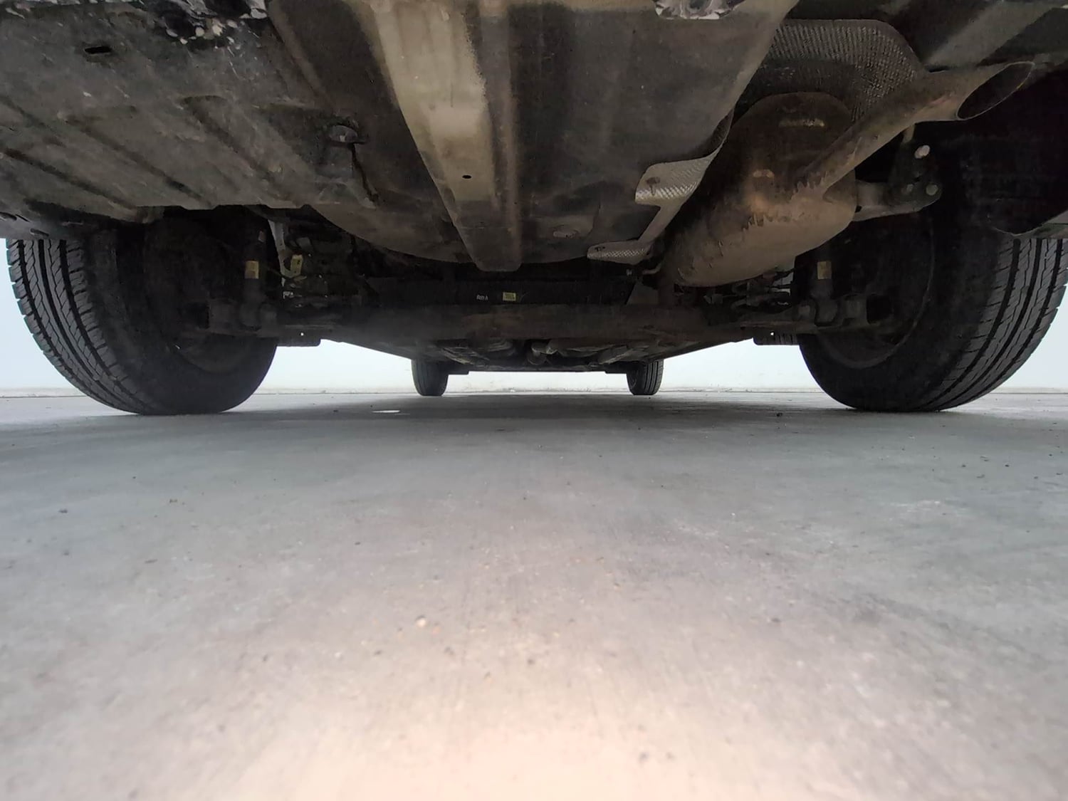 Used 2022 Hyundai Aura S 1.2 CNG Cng Manual extra REAR UNDERBODY VIEW (TAKEN FROM REAR)