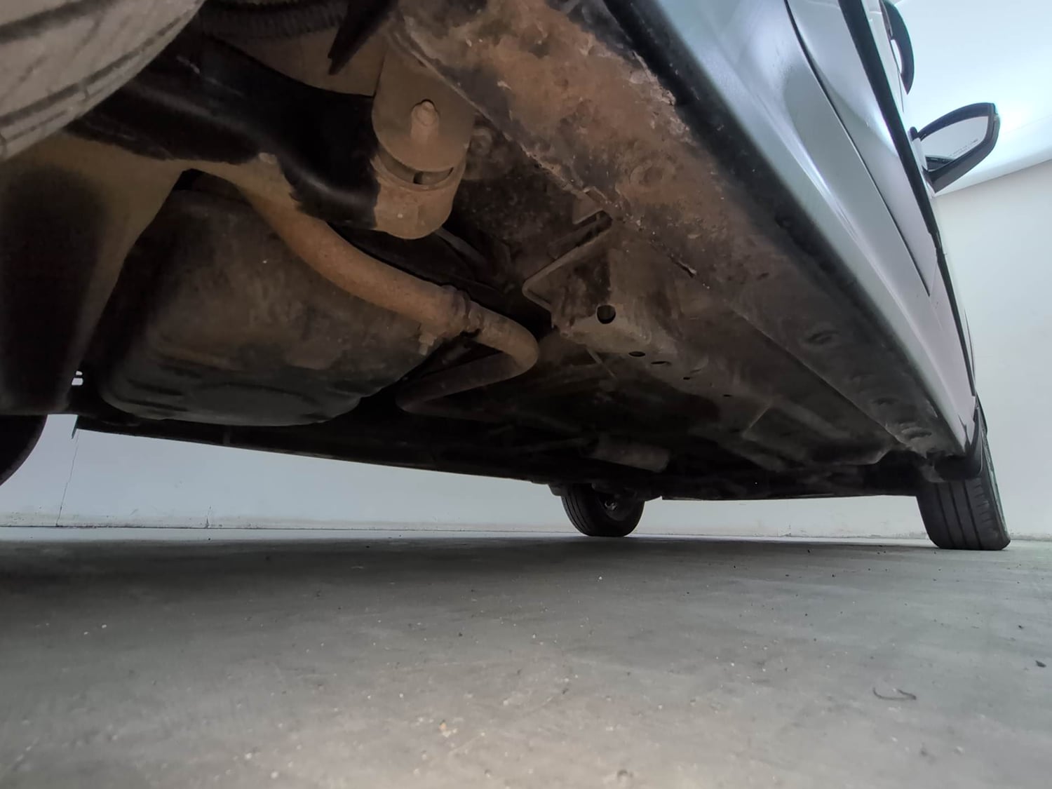 Used 2019 Tata Tigor Revotron XZA Petrol Automatic extra REAR RIGHT UNDERBODY VIEW