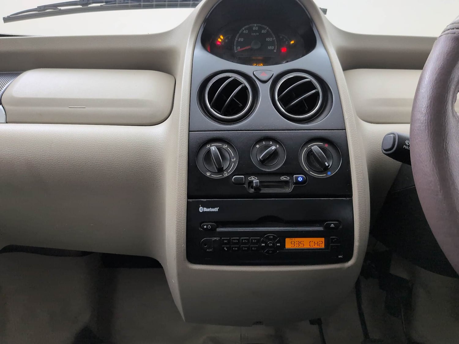 Used 2016 Tata Nano Twist XT Petrol Manual interior MUSIC SYSTEM & AC CONTROL VIEW