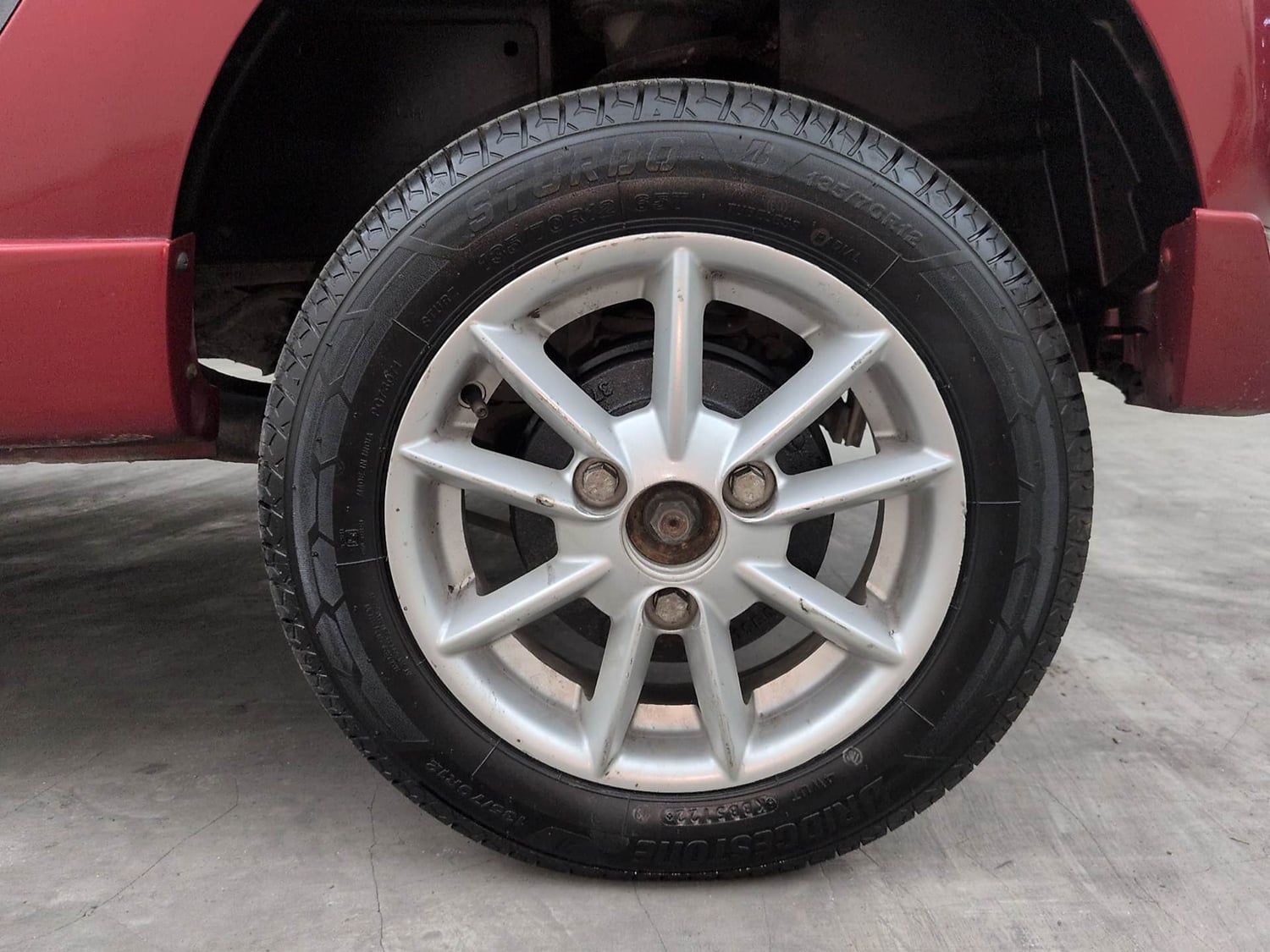 Used 2016 Tata Nano Twist XT Petrol Manual tyres LEFT REAR TYRE RIM VIEW