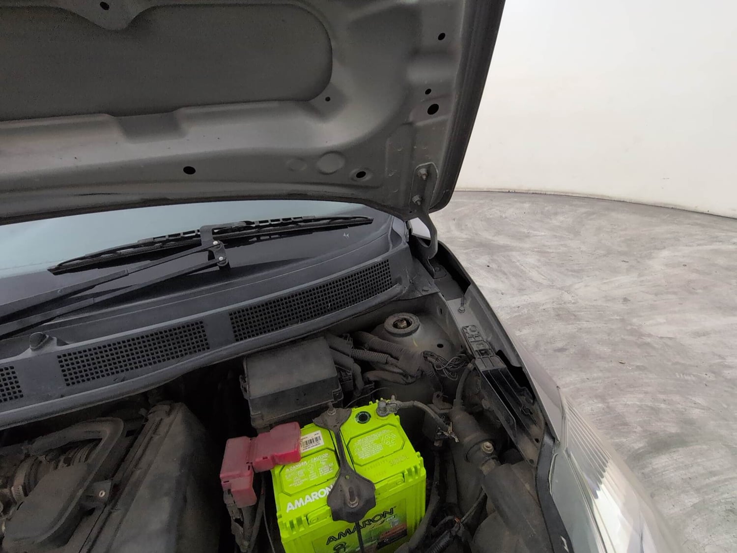 Used 2019 Datsun GO T(O) Petrol Manual engine ENGINE LEFT SIDE HINGE & APRON VIEW