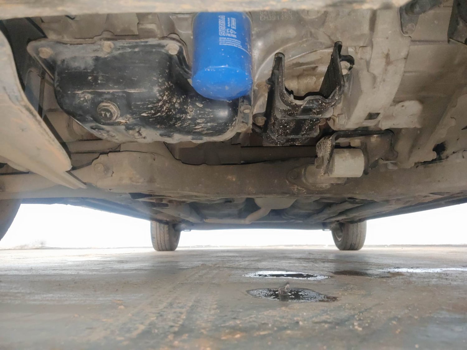 Used 2014 Hyundai Xcent S 1.2 (O) Petrol Manual extra FRONT LEFT UNDERBODY VIEW