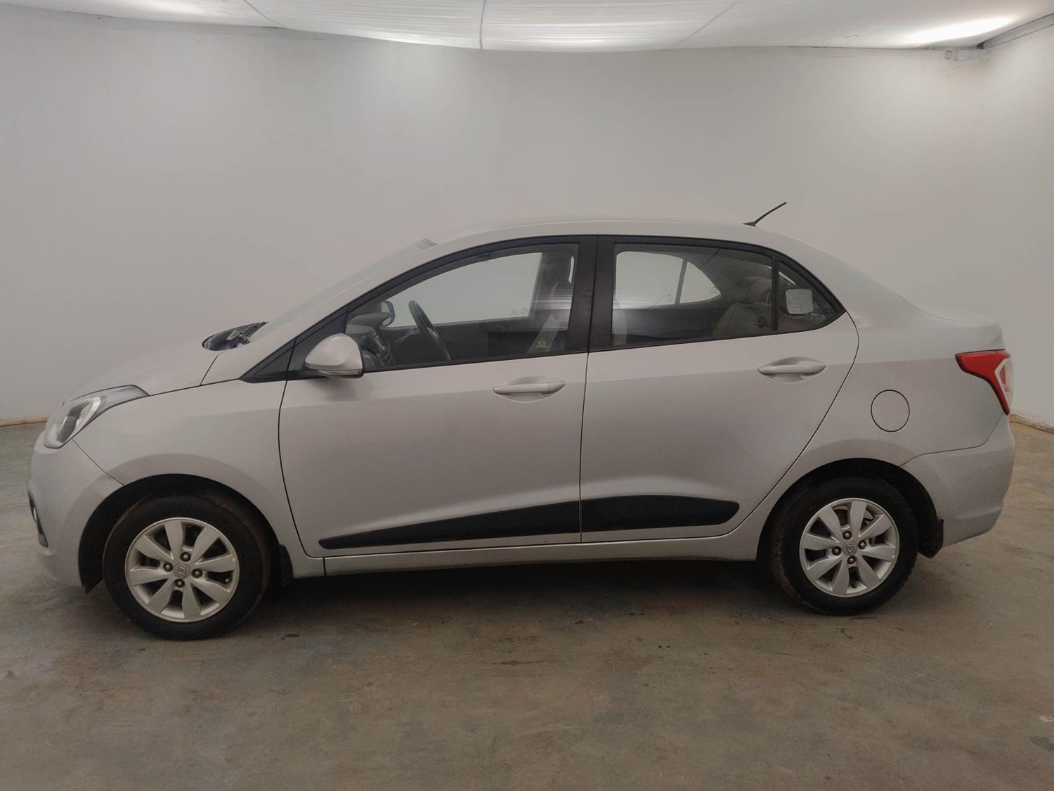 Used 2014 Hyundai Xcent S 1.2 (O) Petrol Manual exterior LEFT SIDE VIEW