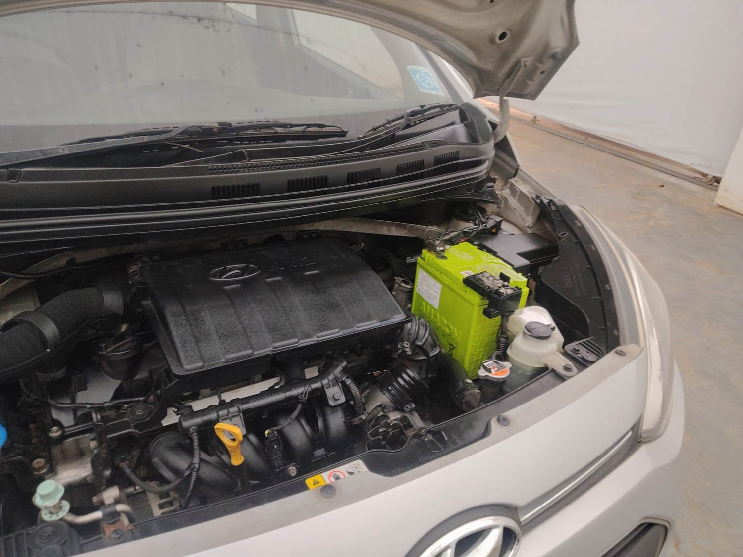 Used 2014 Hyundai Xcent S 1.2 (O) Petrol Manual engine ENGINE LEFT SIDE VIEW
