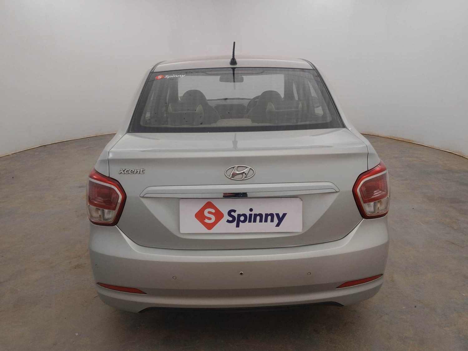 Used 2014 Hyundai Xcent S 1.2 (O) Petrol Manual exterior BACK VIEW