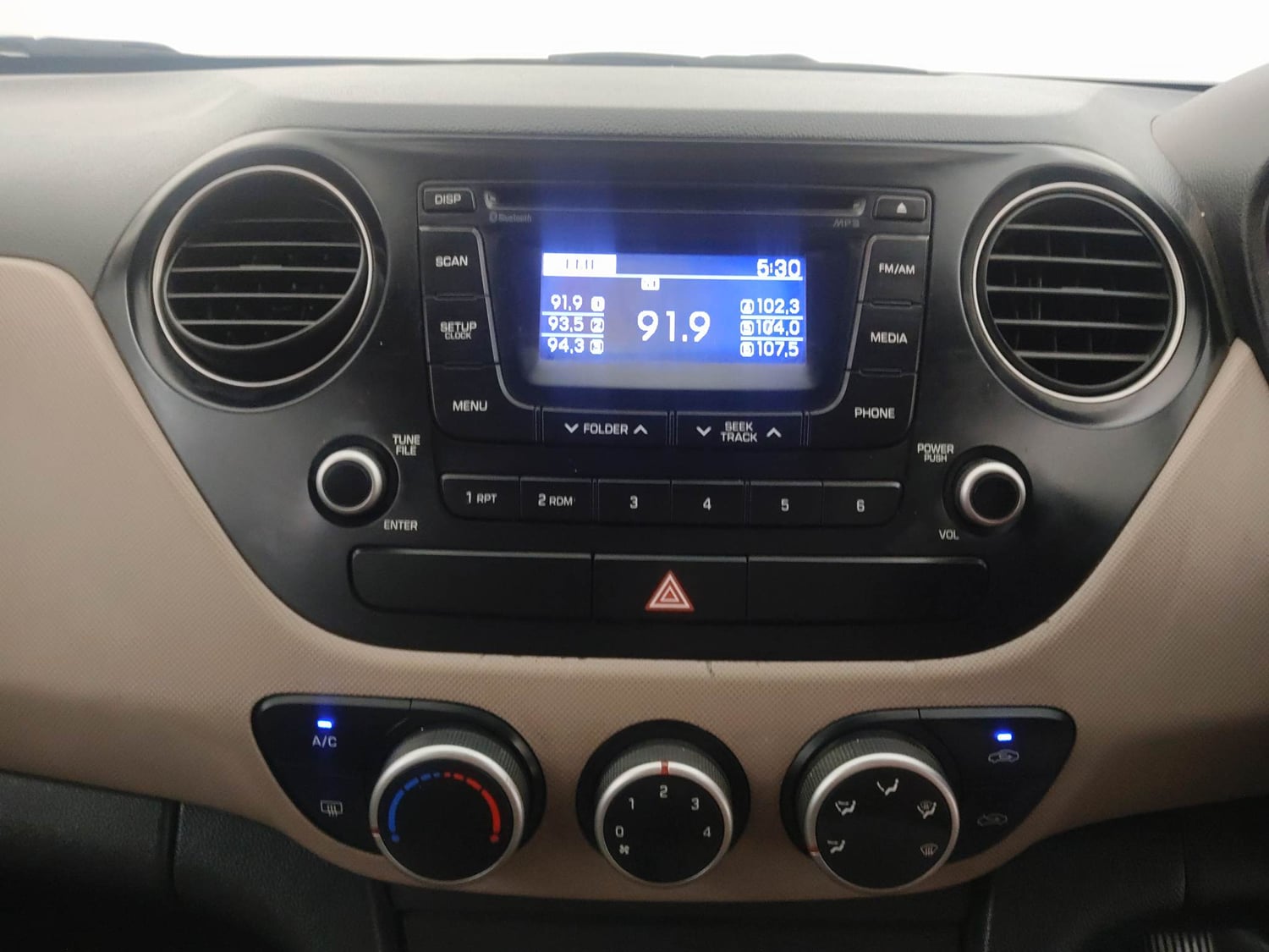 Used 2014 Hyundai Xcent S 1.2 (O) Petrol Manual interior MUSIC SYSTEM & AC CONTROL VIEW