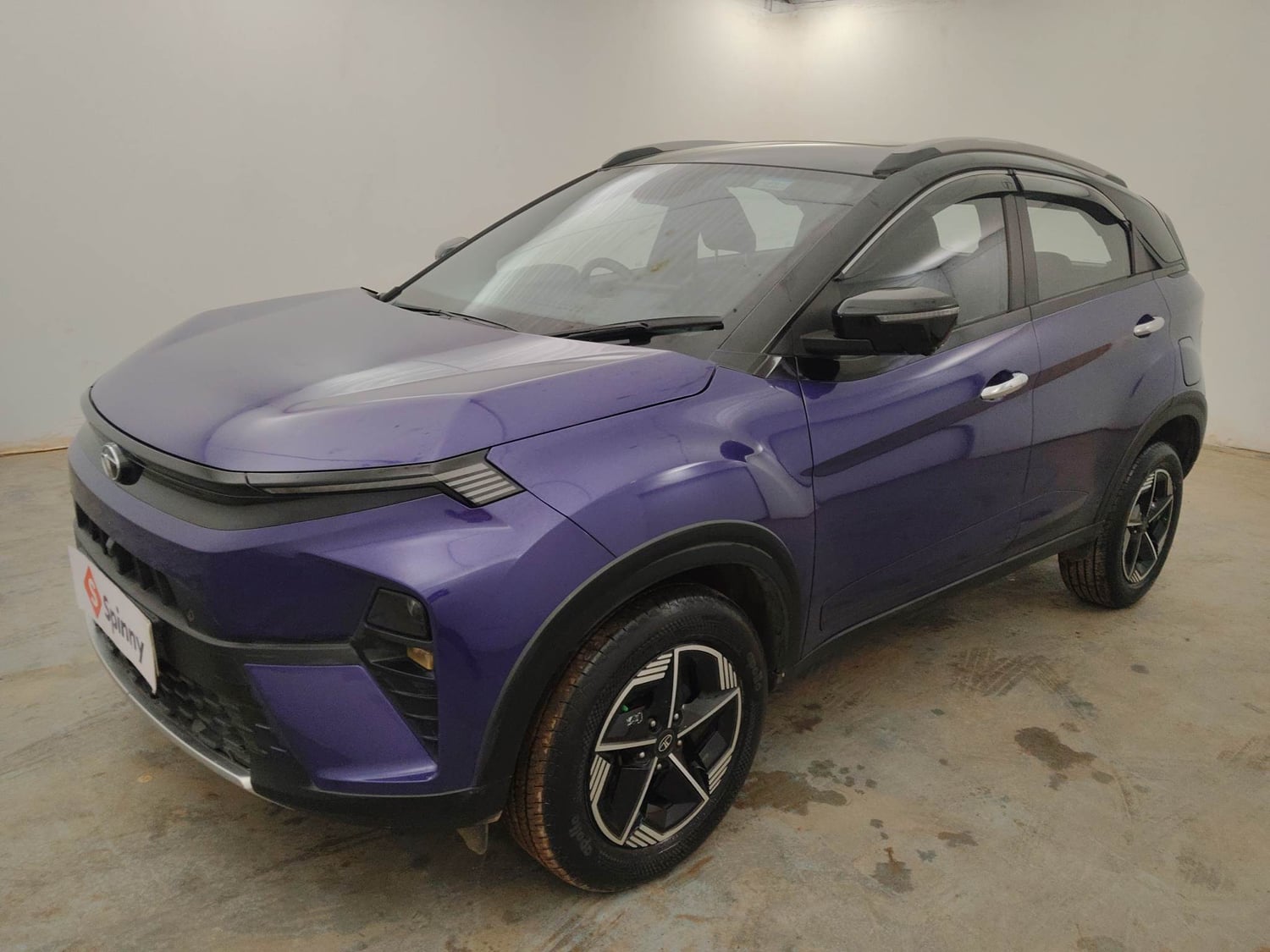 Used 2024 Tata Nexon Fearless Plus S Purple 1.5 Revotorq Diesel 6AMT Dual Tone Diesel Automatic exterior LEFT FRONT CORNER VIEW