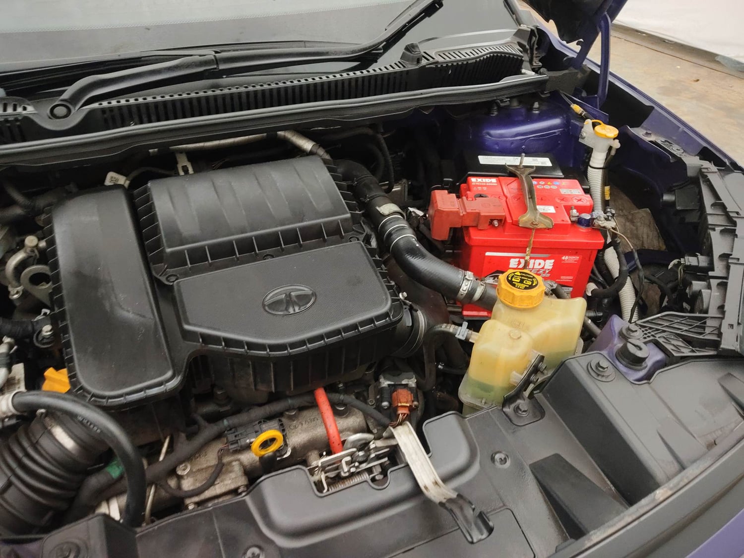 Used 2024 Tata Nexon Fearless Plus S Purple 1.5 Revotorq Diesel 6AMT Dual Tone Diesel Automatic engine ENGINE LEFT SIDE VIEW