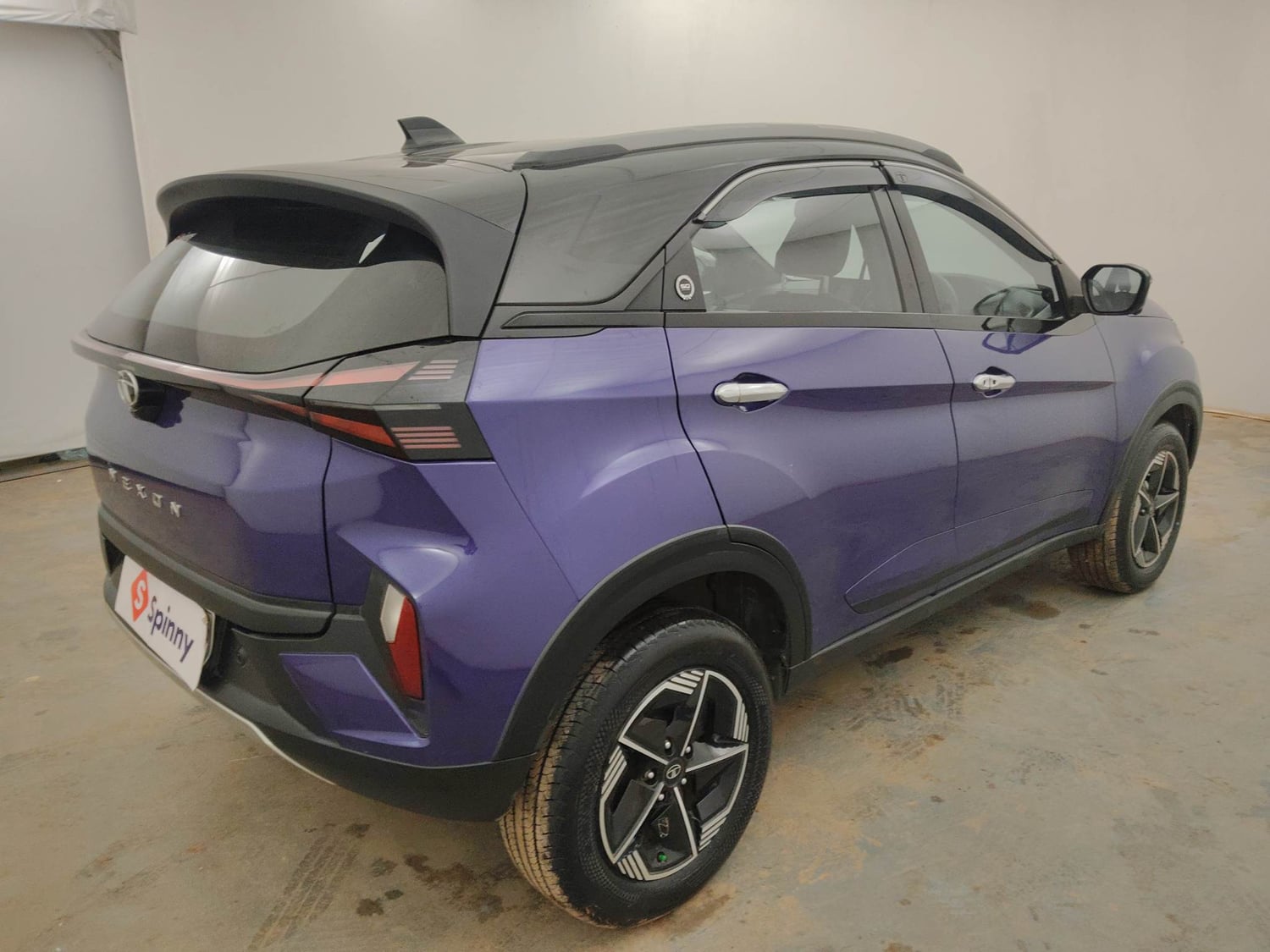 Used 2024 Tata Nexon Fearless Plus S Purple 1.5 Revotorq Diesel 6AMT Dual Tone Diesel Automatic exterior RIGHT REAR CORNER VIEW