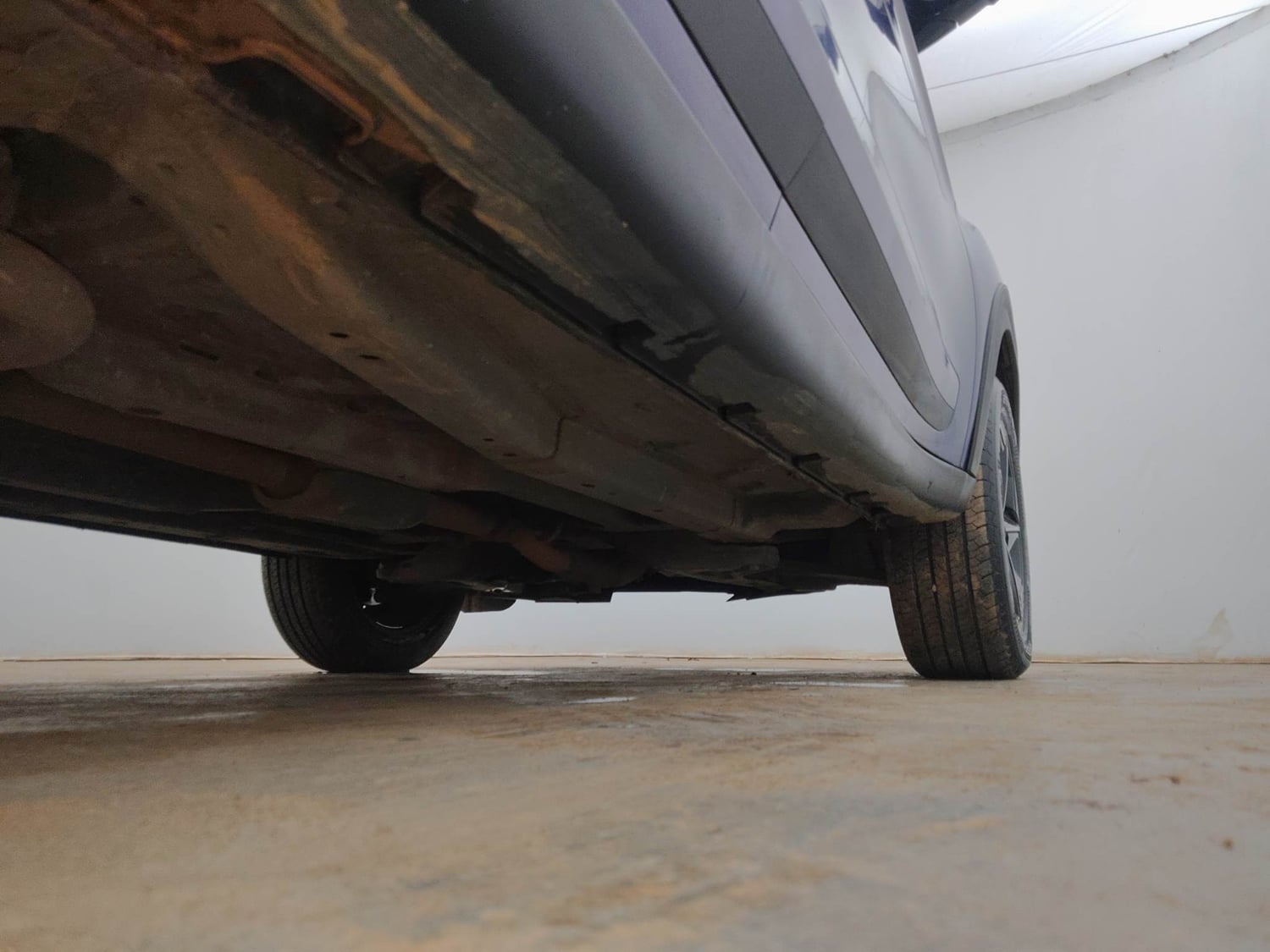 Used 2024 Tata Nexon Fearless Plus S Purple 1.5 Revotorq Diesel 6AMT Dual Tone Diesel Automatic extra REAR RIGHT UNDERBODY VIEW