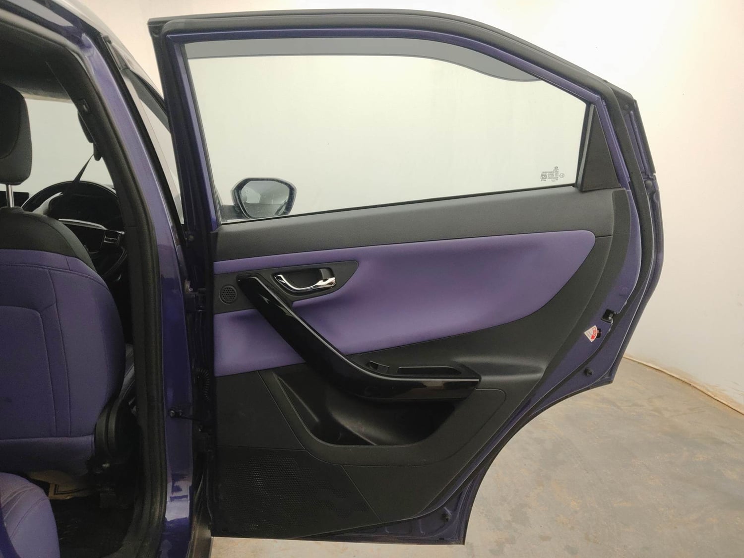 Used 2024 Tata Nexon Fearless Plus S Purple 1.5 Revotorq Diesel 6AMT Dual Tone Diesel Automatic interior RIGHT REAR DOOR OPEN VIEW