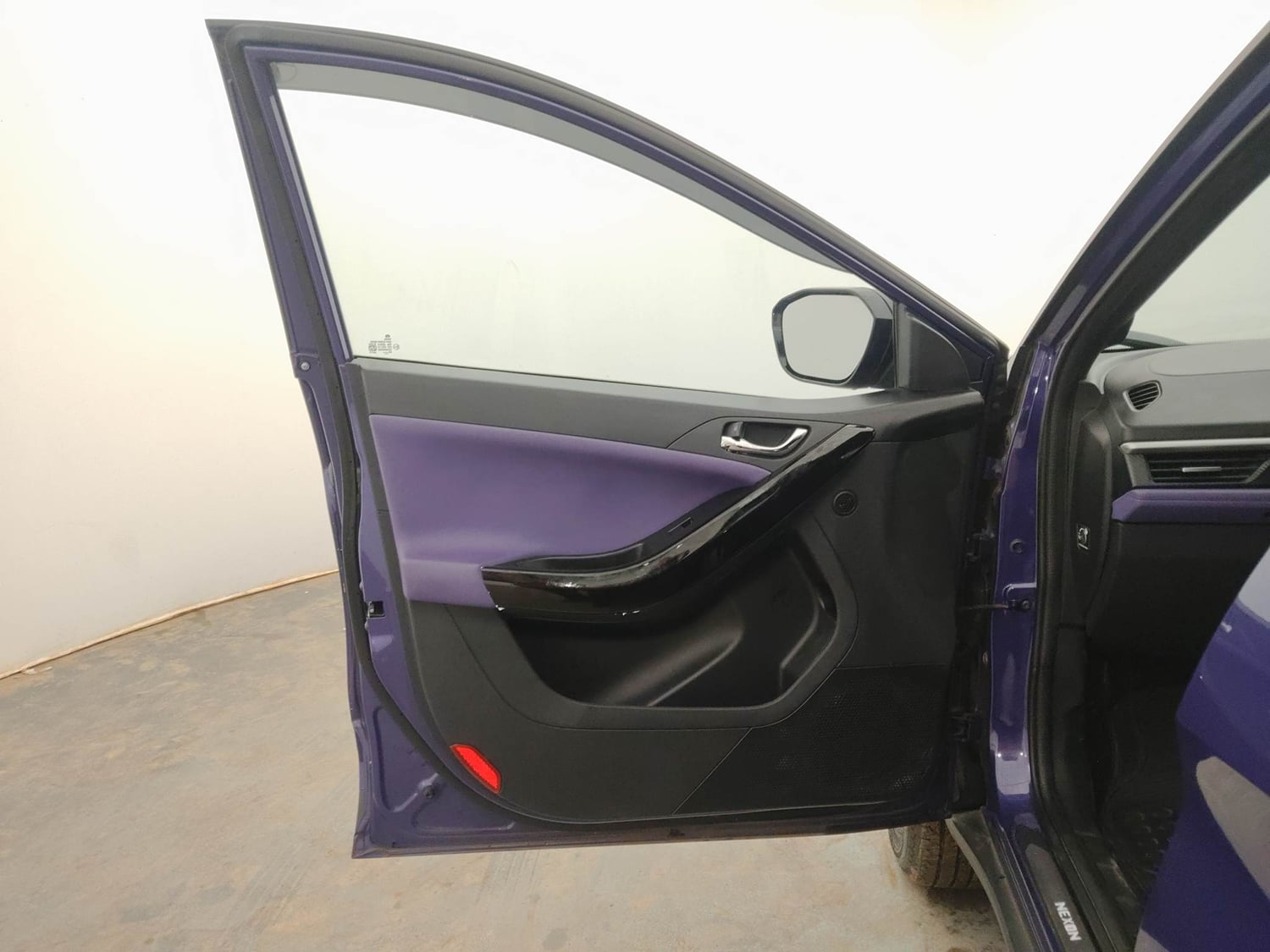 Used 2024 Tata Nexon Fearless Plus S Purple 1.5 Revotorq Diesel 6AMT Dual Tone Diesel Automatic interior LEFT FRONT DOOR OPEN VIEW